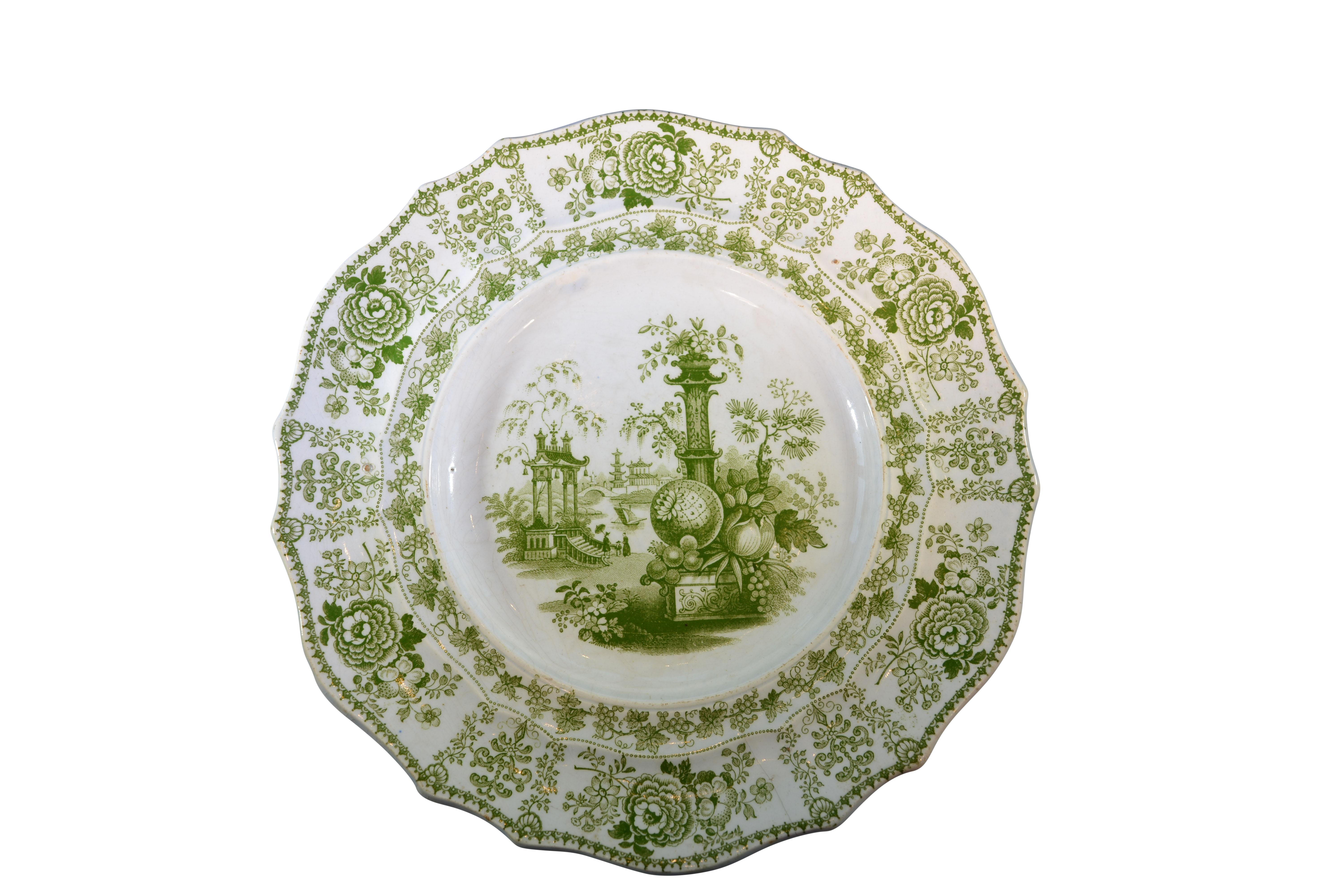 Lovely pair of coordinating green transferware plates. The Davenport mark appears to be first used in 1842.