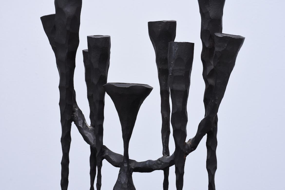 Handmade, 9-arm brutalism candleholder made of sturdy cast iron, 1960s.