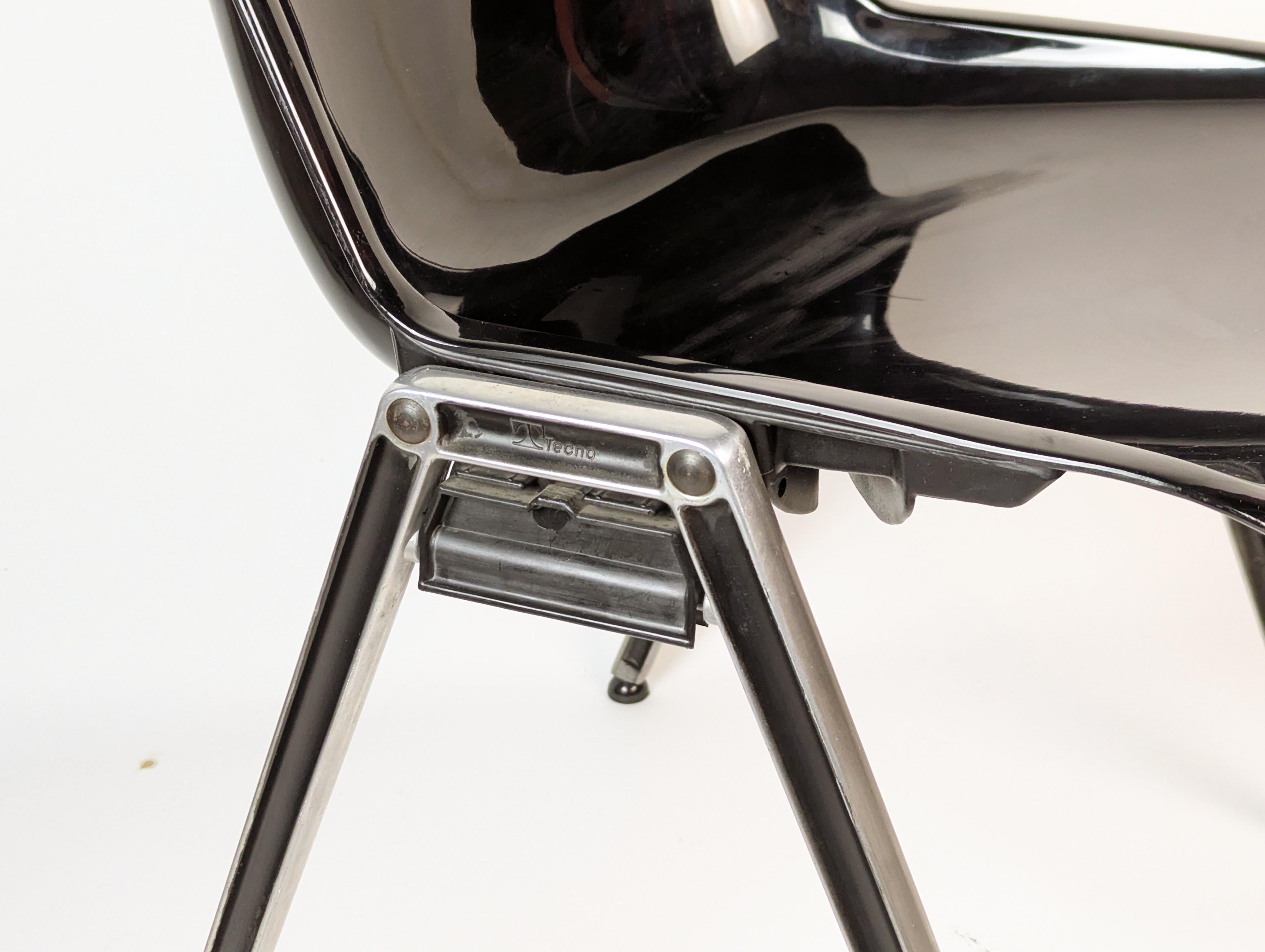 Italian 9 Black plastic & Aluminum 1970s MODUS stackable chairs by Borsani for Tecno For Sale