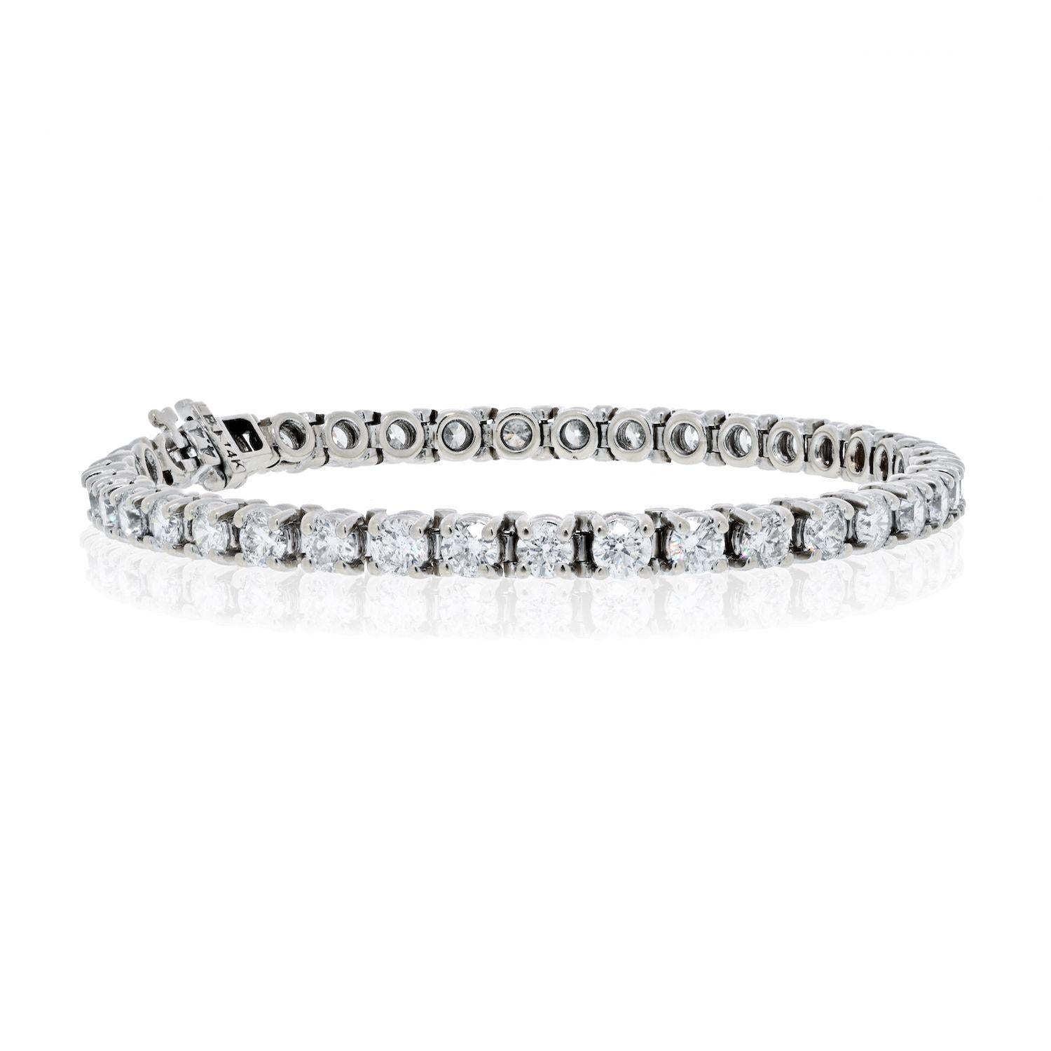 Classic tennis bracelet that every woman desires. This bracelet makes a beautiful mother of the bride, or a bridal gift. 
Mounted in durable 14K White Gold with 38 Round Brilliant Cut Diamonds of 0.24ct each. Total carat weight of the bracleet