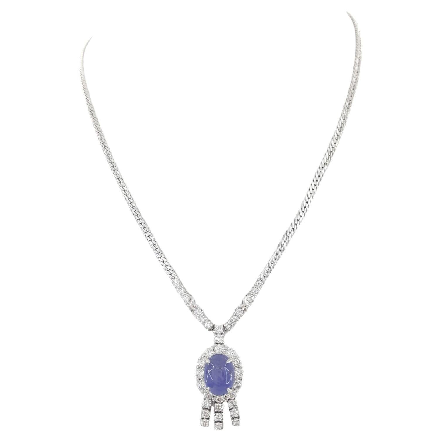 Modern  9 Carat Cabochon Star Sapphire with 2 Ct. Round Brilliant Cut Diamond Necklace For Sale