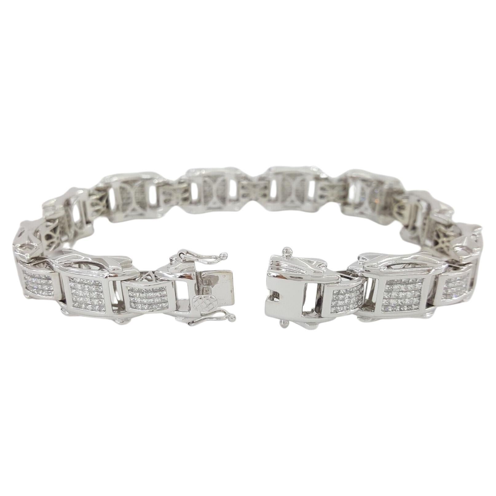 Elevate your style with the unparalleled luxury of this Men's Bracelet, a masterpiece in 14k White Gold adorned with a stunning total of 9 ct of Invisible Set Princess Cut Diamonds.

Key Features:

This remarkable bracelet boasts a substantial