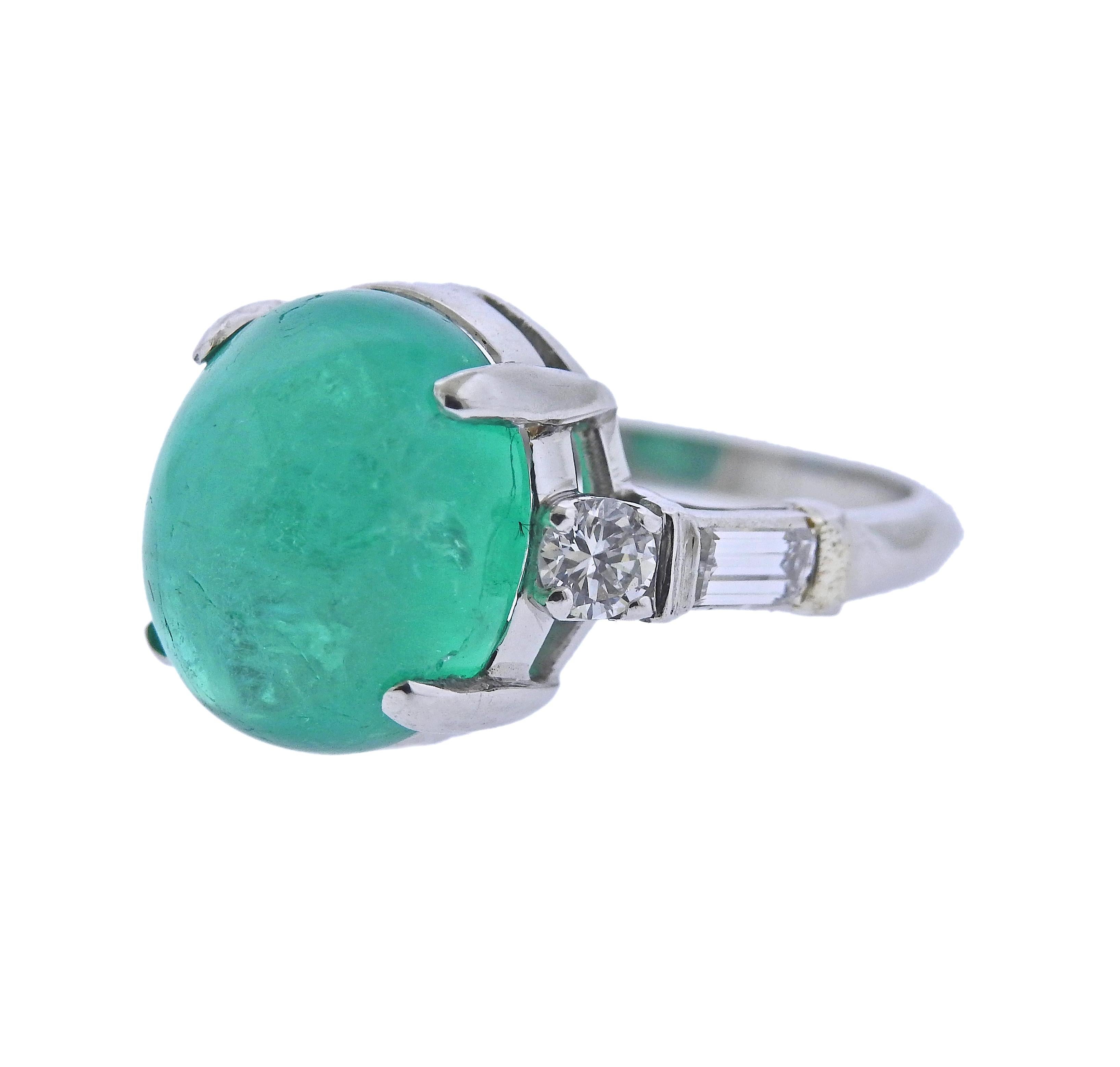 Platinum ring, set with center approx. 9 carat emerald cabochon (measuring approx. 12.71 x 10.6 x 8.7mm) with 0.44ctw in diamonds. Ring size - 5.5. Marked Plat. Weight - 7.2 grams.