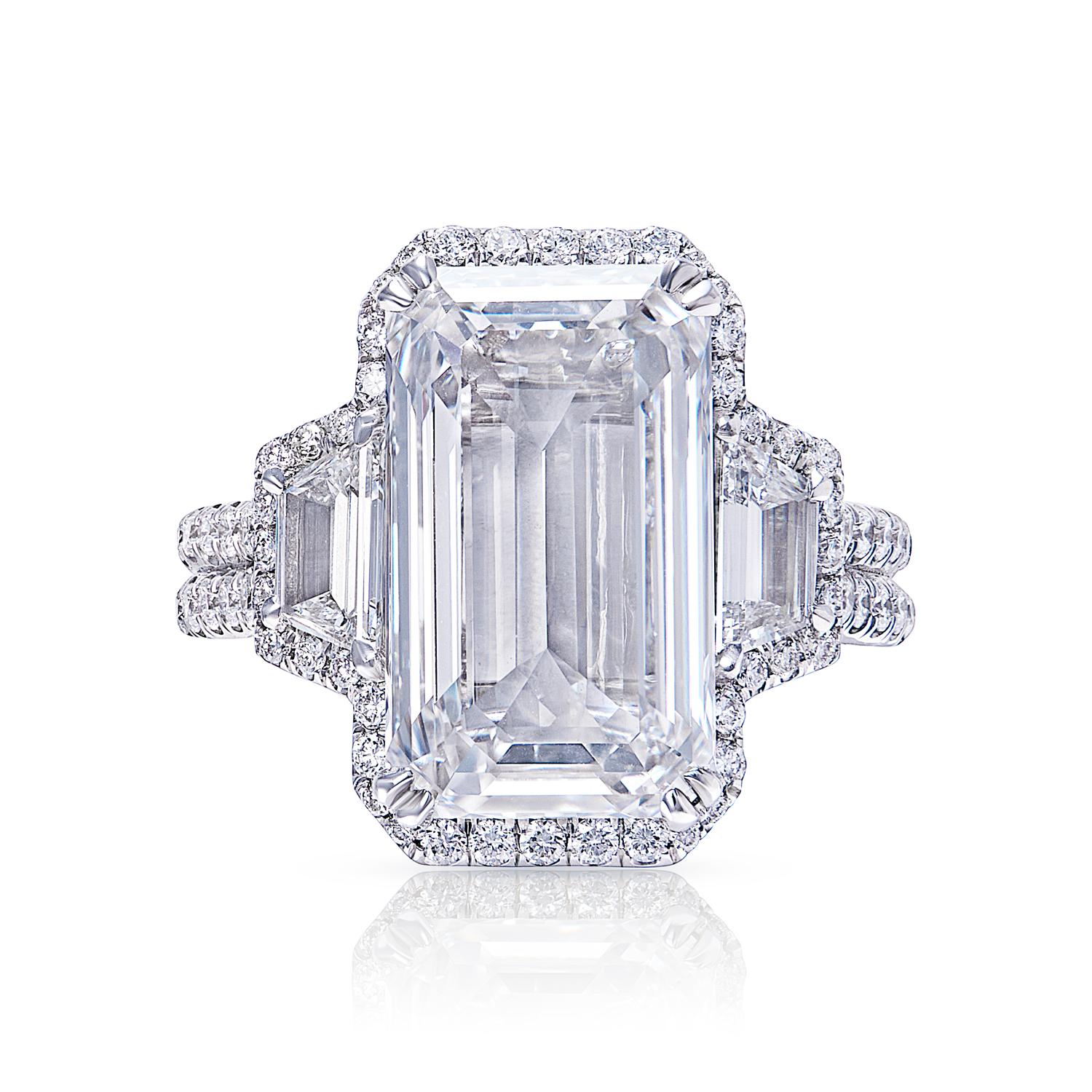 An emerald-cut diamond ring is a classic and sophisticated choice that will never go out of style. The rectangular shape of the emerald-cut diamond is unique and eye-catching, and the slender, tapered fingers of the setting show off the diamond to