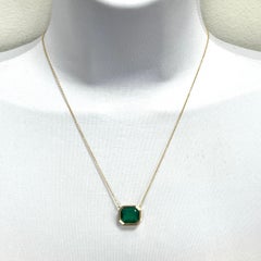 9 Carat Emerald Octagonal East West Bezel Necklace in 18K Yellow Gold