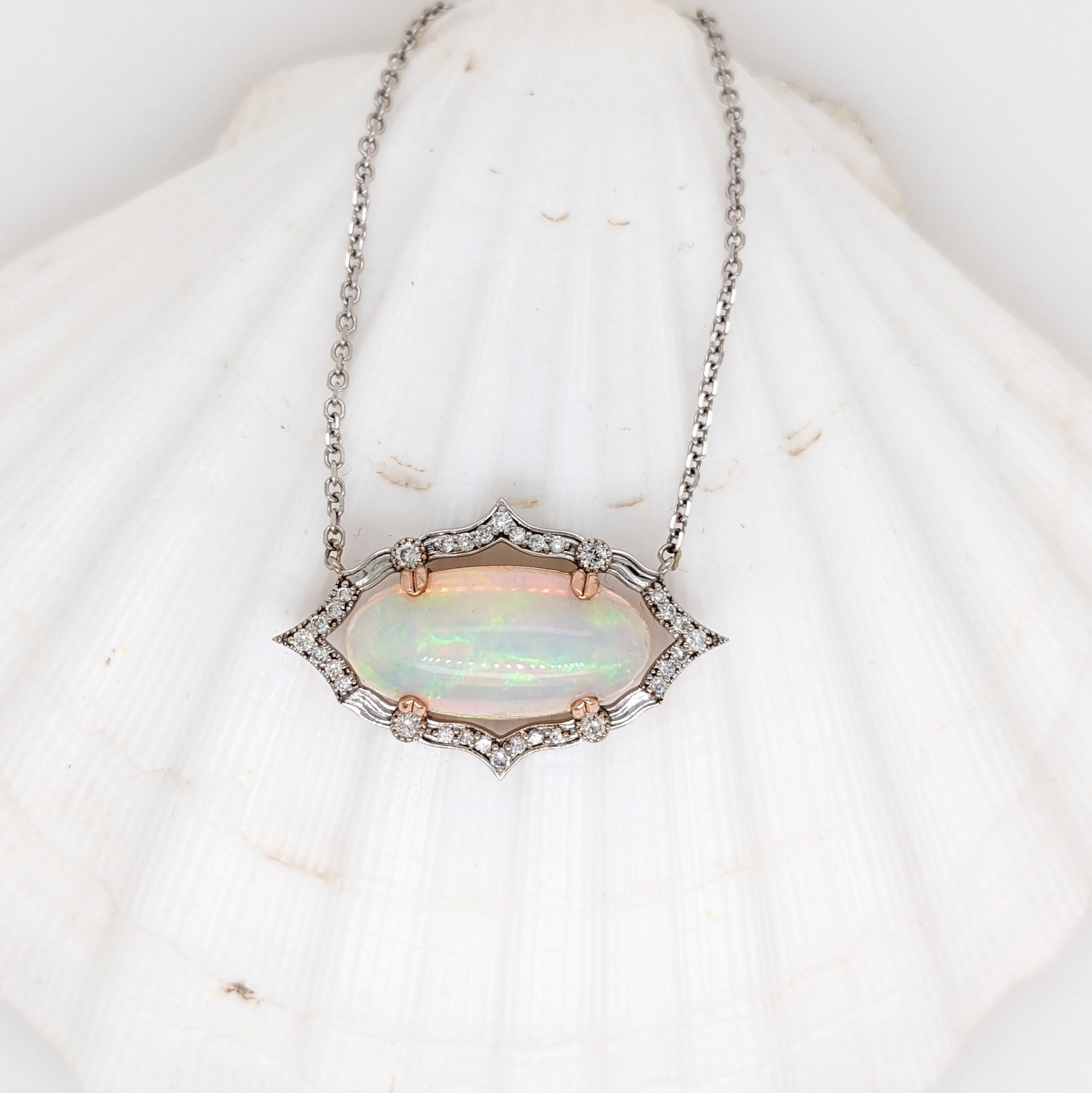 Specifications

Item Type: Pendant
Stone: Opal
Origin: Ethiopia
Treatment: None
Hardness: 6
Cut: Cabochon
Shape: Oval 
Stone size: 21x10mm
Opal weight: 8.49cts
Metal: Solid 14k/5.11 gms
Diamonds S/I GH: 32/0.37cts

Introducing our breathtaking 9
