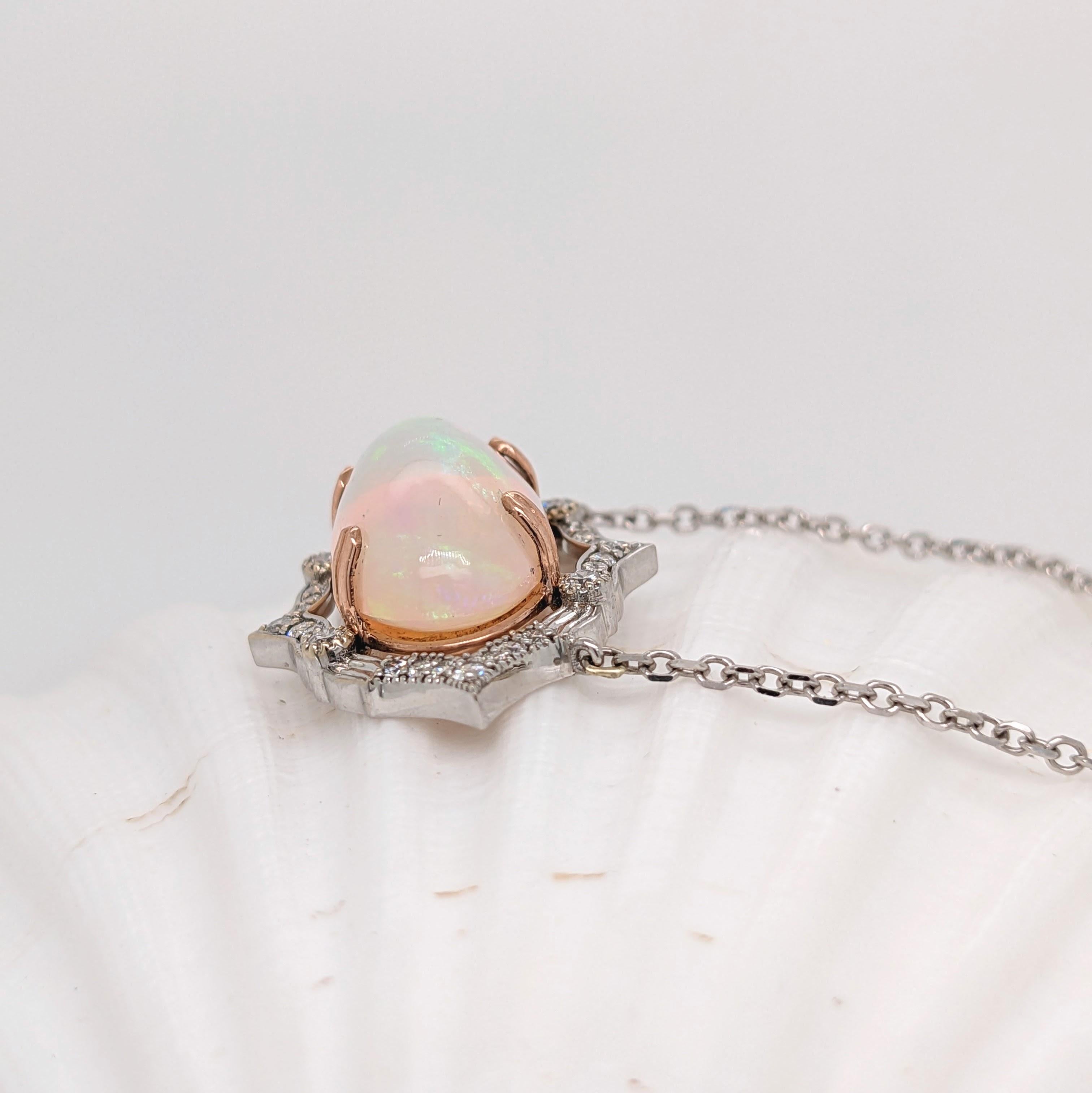 Retro 9 Carat Ethiopian Opal East West Pendant in 14K Dual Tone Gold with Diamond Halo For Sale