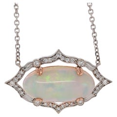 9 Carat Ethiopian Opal East West Pendant in 14K Dual Tone Gold with Diamond Halo