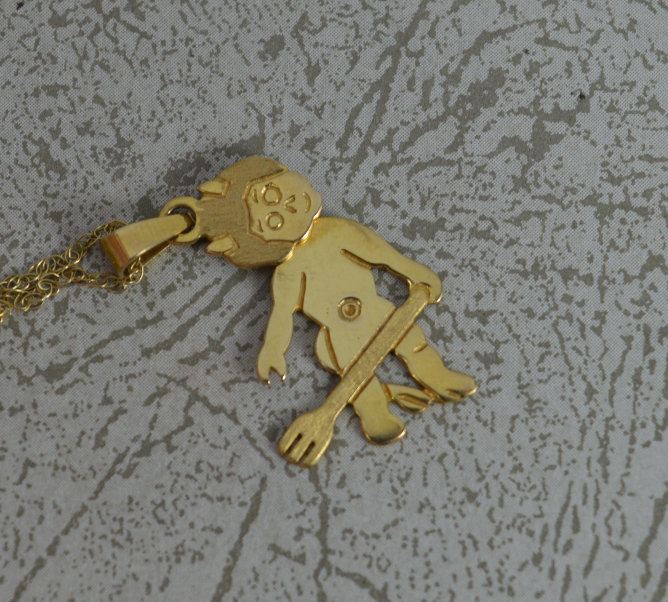 Contemporary 9 Carat Gold Little Devil Pendant & Chain with Swivel Head For Sale