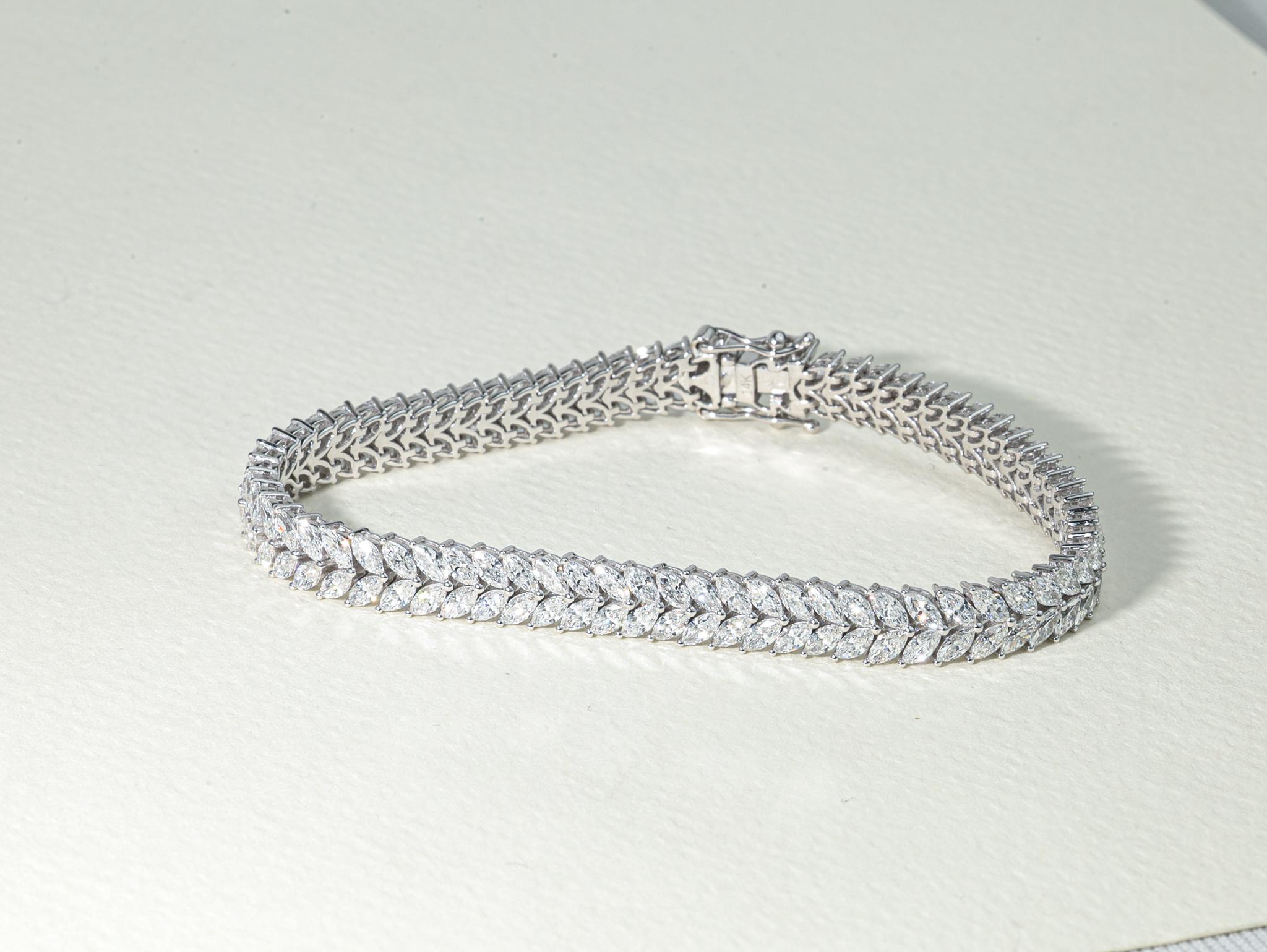 An Icon of Grace, Fire, and Unending Elegance

This magnificent marquise-cut diamond tennis bracelet is an ode to timeless sophistication and contemporary finesse. Showcasing approximately 9.1 carats total weight of natural marquise-cut diamonds,