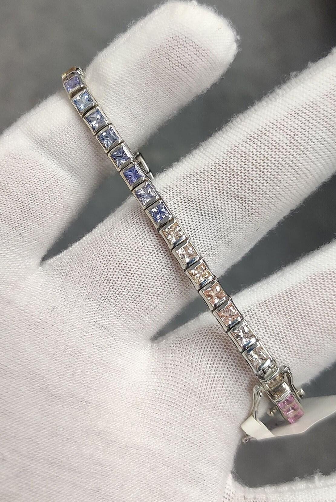 Presenting this beautiful Sapphire Studded Bracelet that is made in high quality Silver 925. All natural sapphires have been used. The multicolored Sapphires give a rainbow-like, and colorful look to this bracelet.

This multicolored bracelet is all