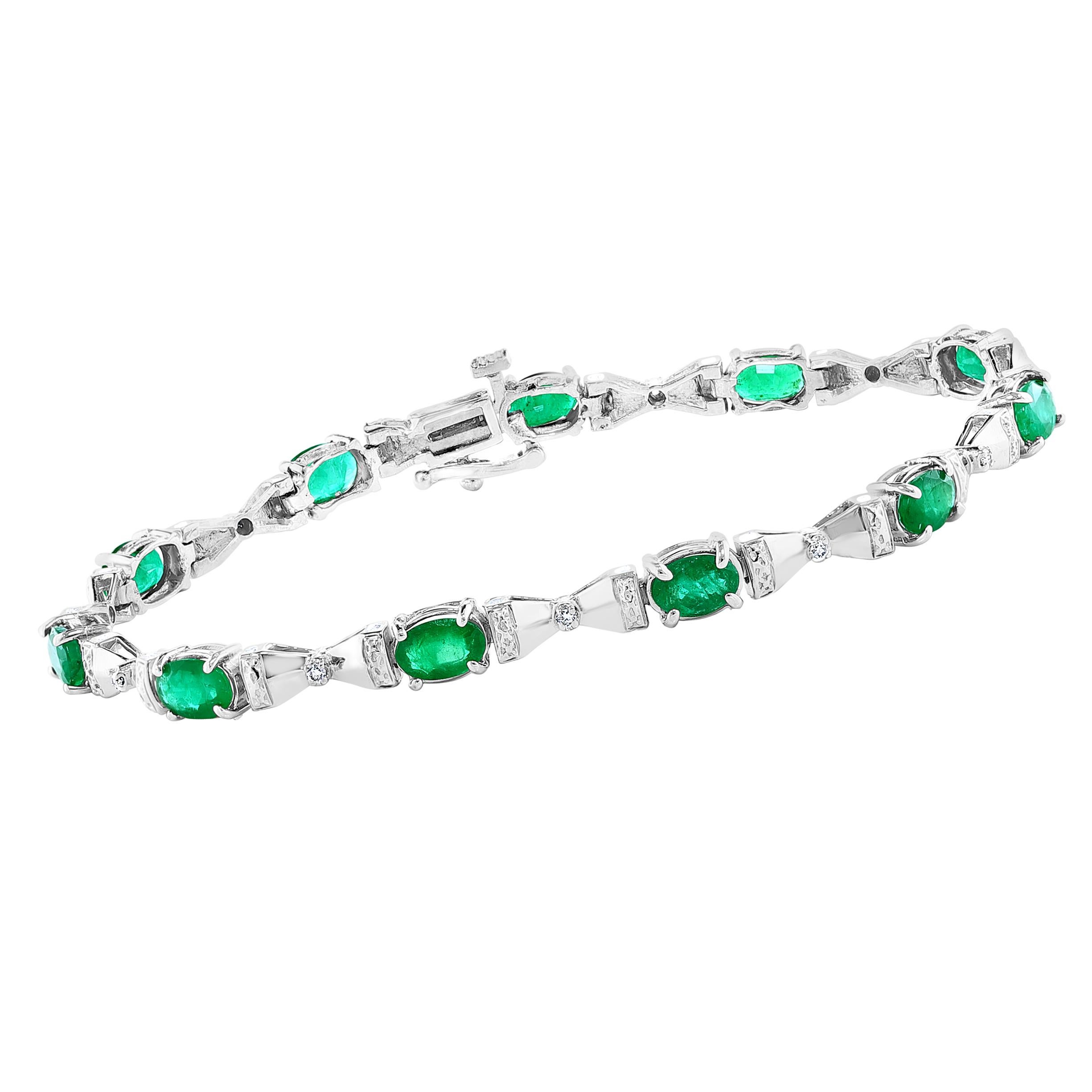 9 Carat Natural Emerald &  1 ct Diamond Cocktail Tennis Bracelet 14 Karat White Gold
 This exceptionally affordable Tennis  bracelet has  11 stones of oval  Emeralds  .  Total weight of the Emeralds is  approximately 9 carat. 
The bracelet is