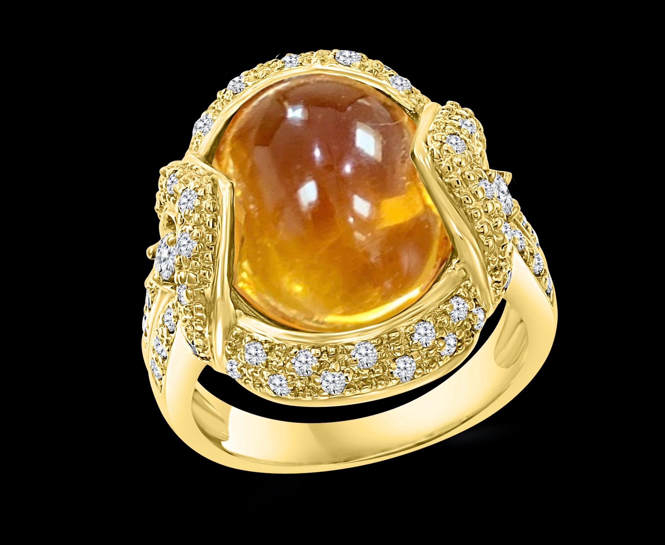 Approximately 9 Carat  Oval Citrin Cabochon And Diamond Ring In 18 Karat Yellow Gold , Estate
This is a ring which has a  approximately 9 carat of high quality Citrine Cabochon 
Color and clarity is very nice.
Diamonds Approximately 1 ct 
18 K