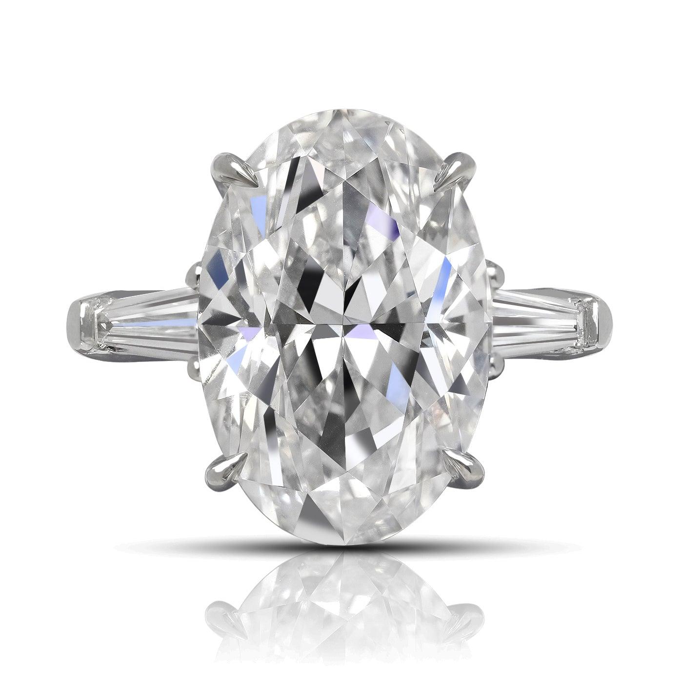 CAROLINE DIAMOND ENGAGEMENT PLATINUM RING BY MIKE NEKTA
 
Center Diamond:
Carat Weight: 8.02 Carats
Color: E*
Clarity: VVS2
Style:  OVAL
*The color of the center diamond  has been permanently modified with high-pressure and high temperature to