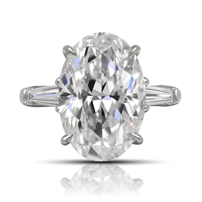 CAROLINE DIAMOND ENGAGEMENT PLATINUM RING BY MIKE NEKTA
 
Center Diamond:
Carat Weight: 8.9 Carats
Color: E
Clarity: VVS2
Style:  OVAL

Ring:
Metal: PLATINUM
Size: Can be adjusted to any size