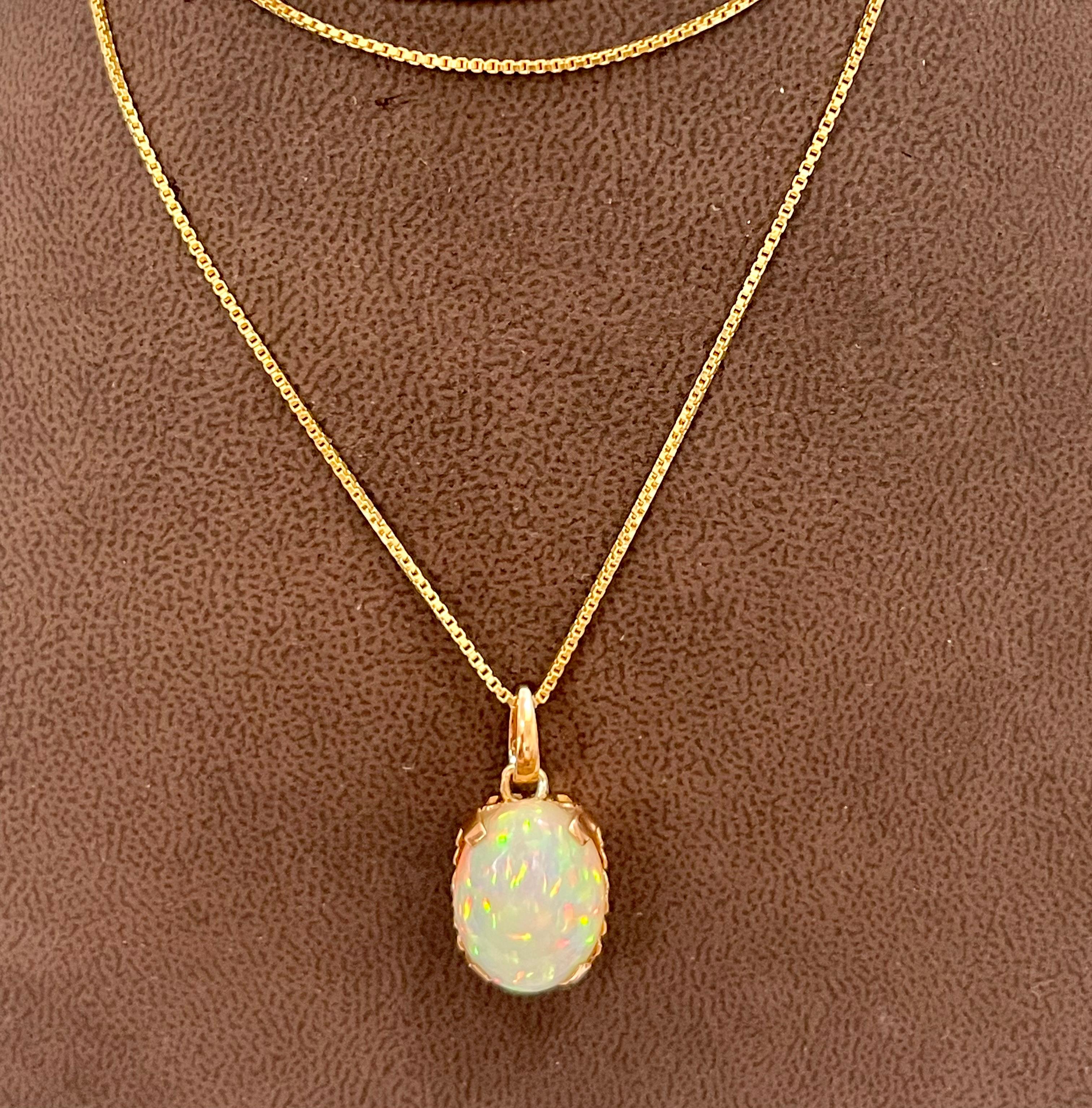Oval Cut 9 Carat Oval Ethiopian Opal Pendant / Necklace 18 Karat + 18 Kt Gold Chain