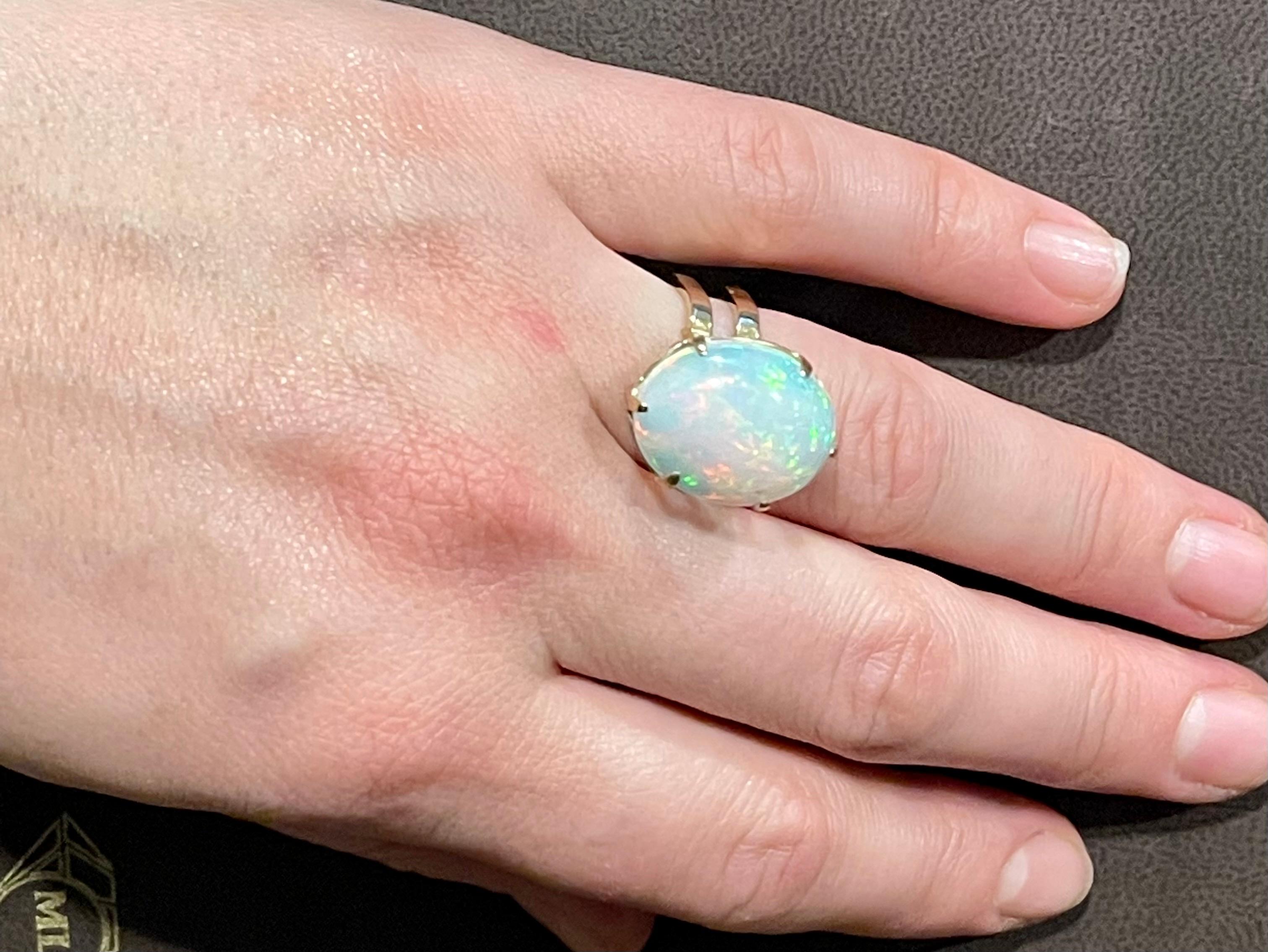 12 Carat Oval Shape Ethiopian Opal Cocktail Ring 14 Karat Yellow Gold For Sale 5