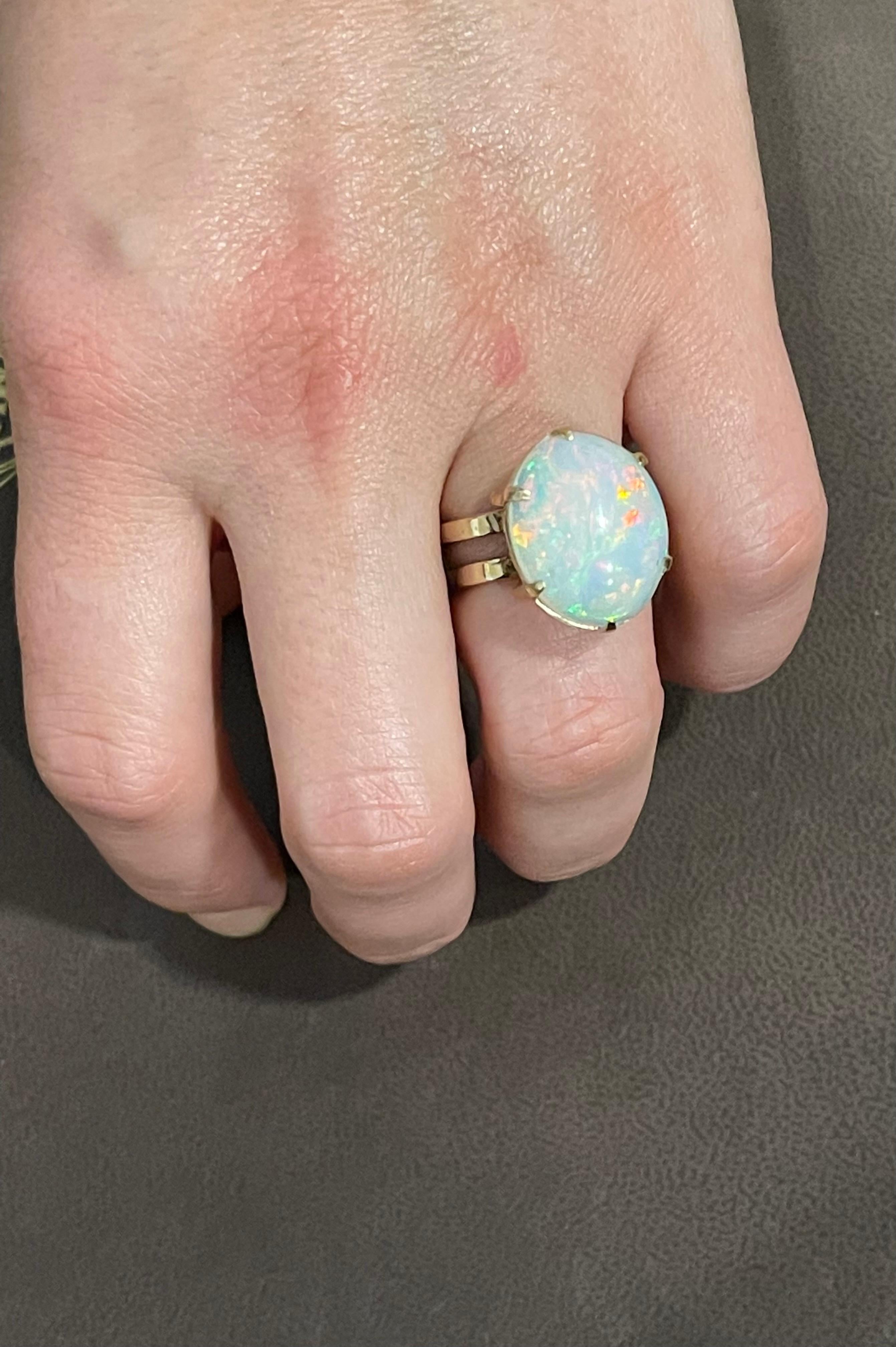 12 Carat Oval Shape Ethiopian Opal Cocktail Ring 14 Karat Yellow Gold For Sale 8