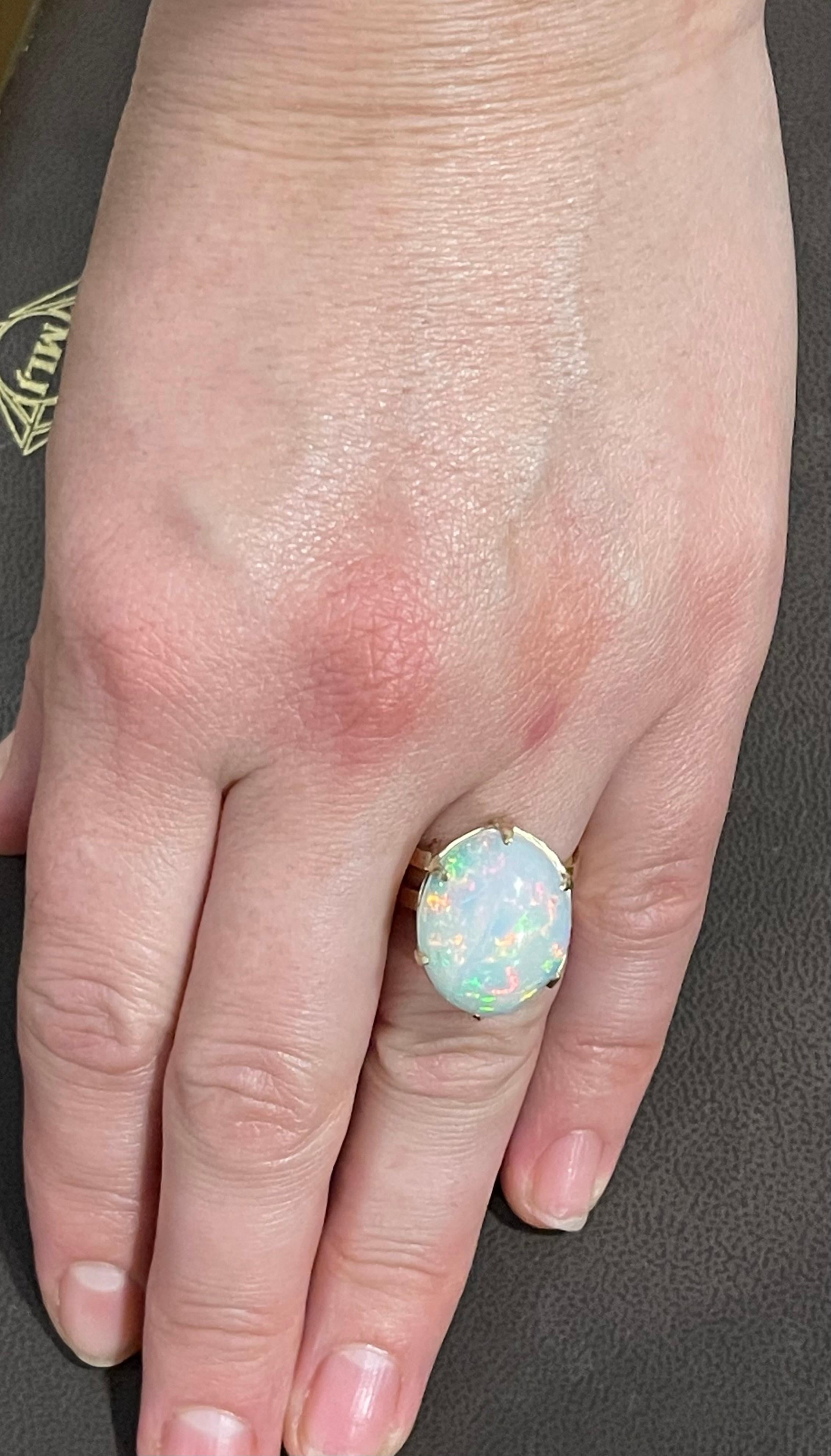 12 Carat Oval Shape Ethiopian Opal Cocktail Ring 14 Karat Yellow Gold For Sale 10