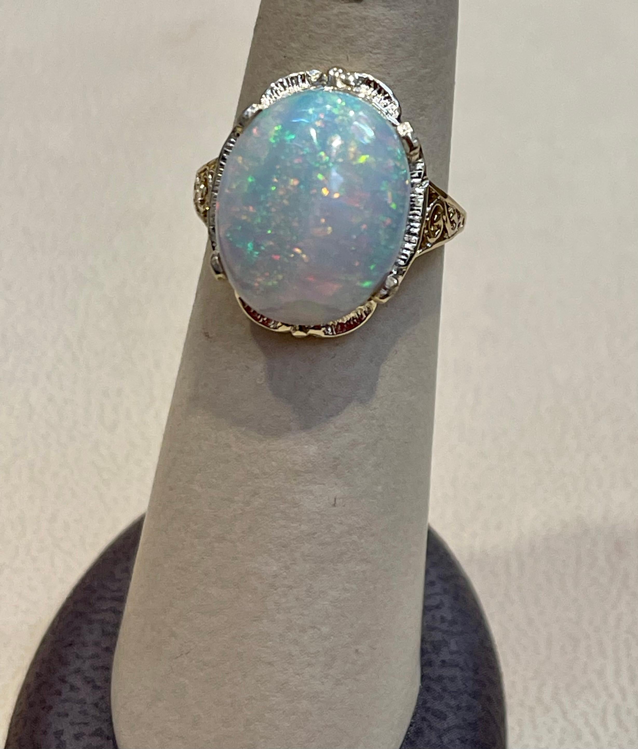9 Carat Oval Shape Ethiopian Opal Cocktail Ring 14 Karat Yellow Gold For Sale 2