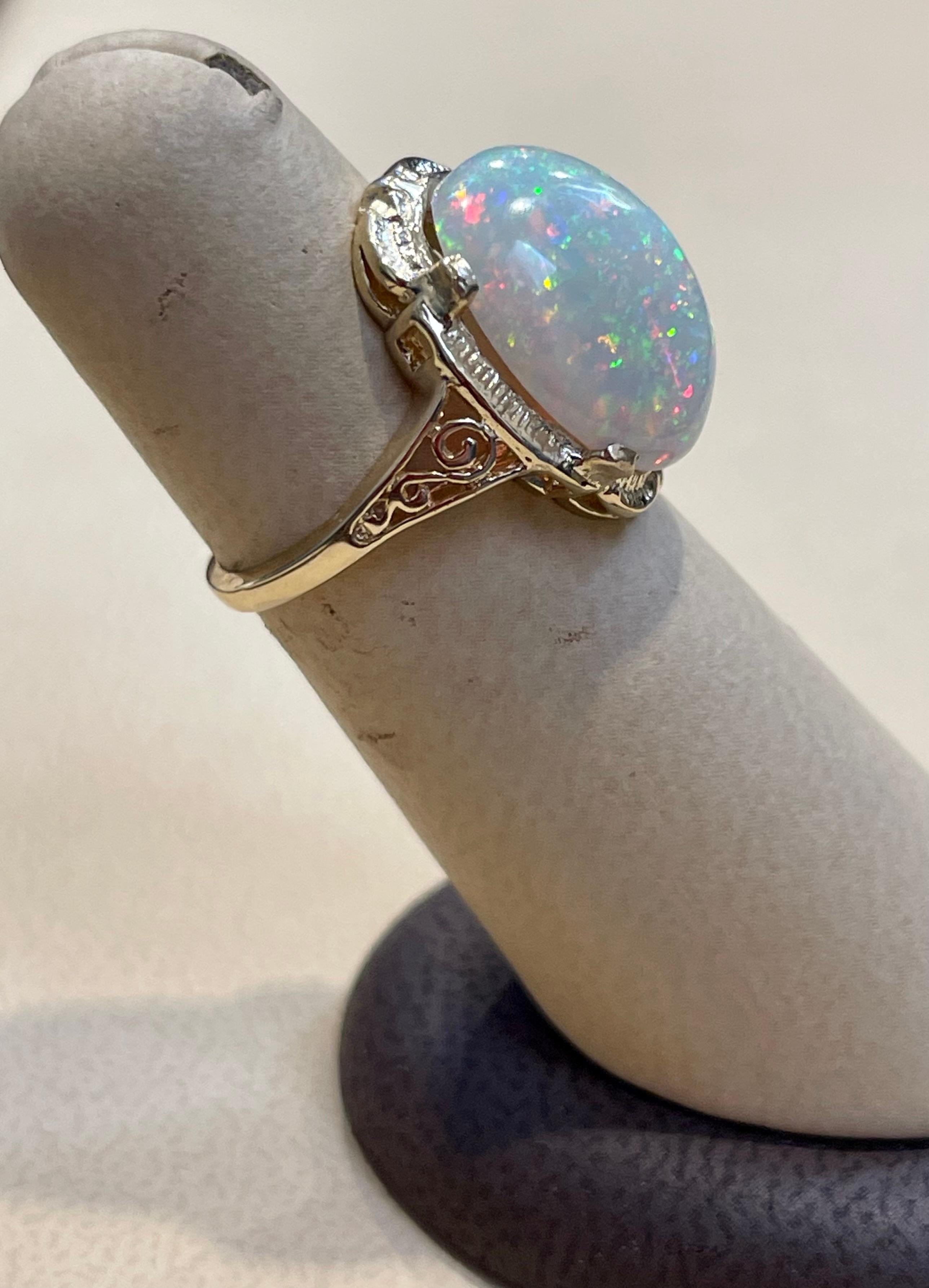 9 Carat Oval Shape Ethiopian Opal Cocktail Ring 14 Karat Yellow Gold For Sale 3