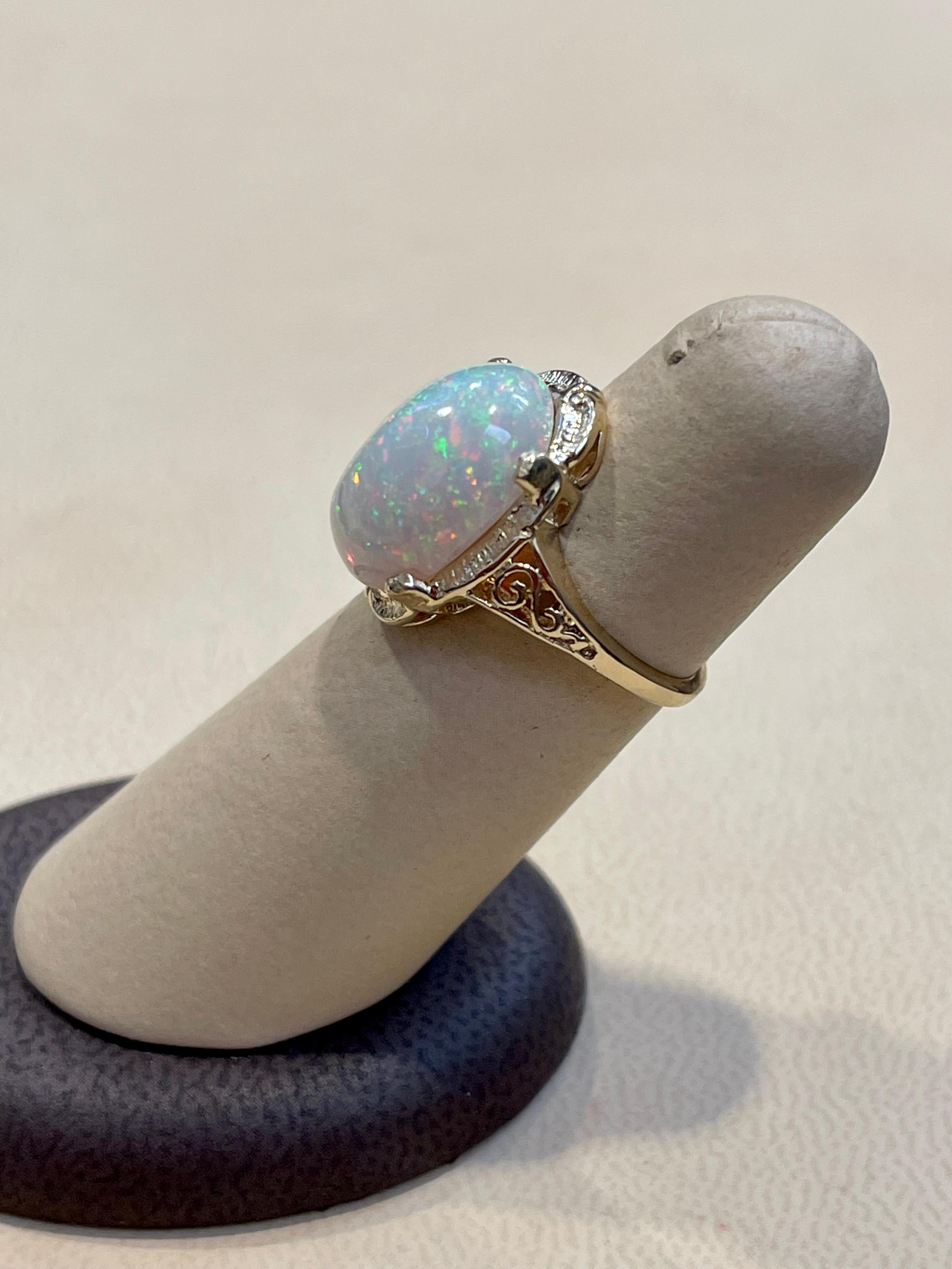 9 Carat Oval Shape Ethiopian Opal Cocktail Ring 14 Karat Yellow Gold For Sale 1