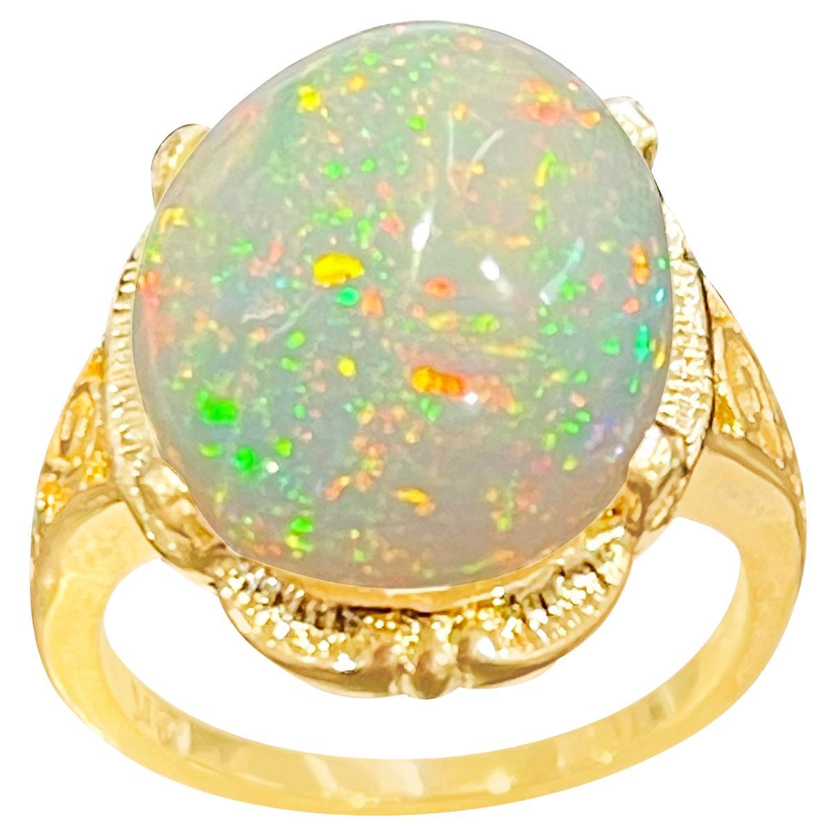 9 Carat Oval Shape Ethiopian Opal Cocktail Ring 14 Karat Yellow Gold For Sale