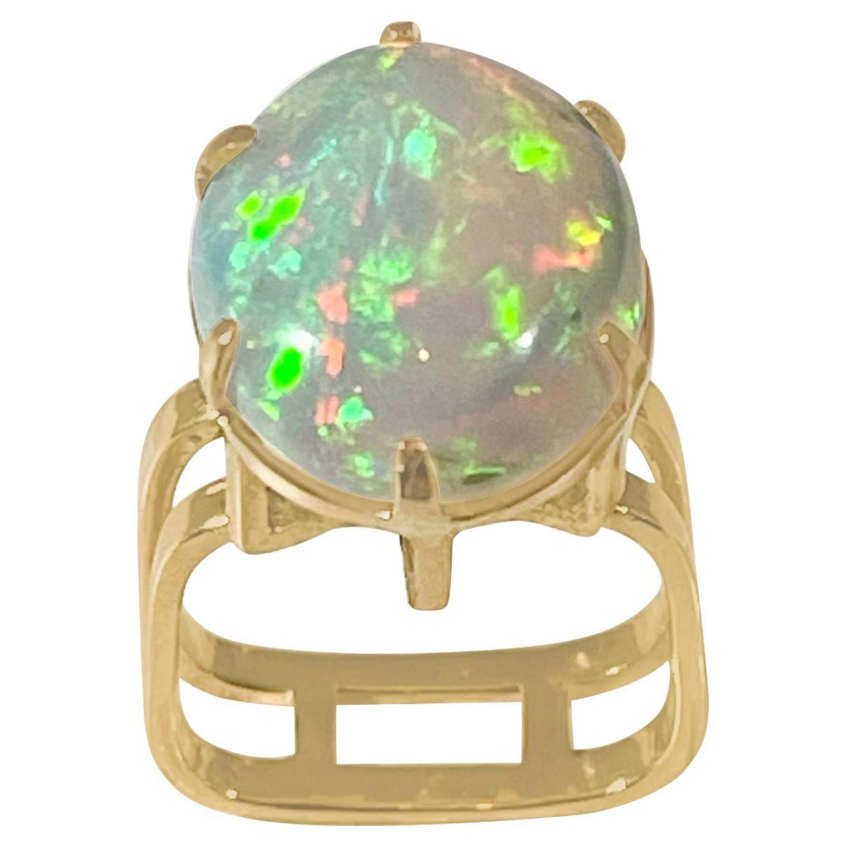 12 Carat Oval Shape Ethiopian Opal Cocktail Ring 14 Karat Yellow Gold For Sale