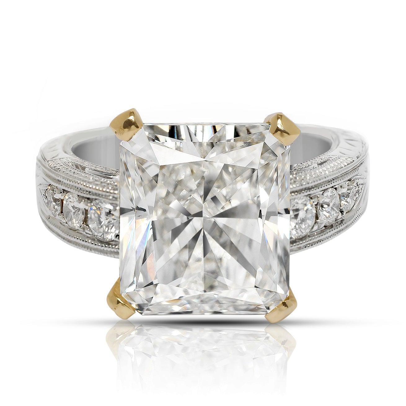 QUEEN DIAMOND ENGAGEMENT 18K GOLD RING BY MIKE NEKTA

CERTIFIED

Center Diamond:
Carat Weight: 8 Carats
Color: F
Clarity: VS2
Style:  RADIANT - SQUARE MODIFIED BRILLIANT
Approximate Measurements: 11.7 x 10 x 7 mm

Ring:
Metal: 18K WHITE & YELLOW