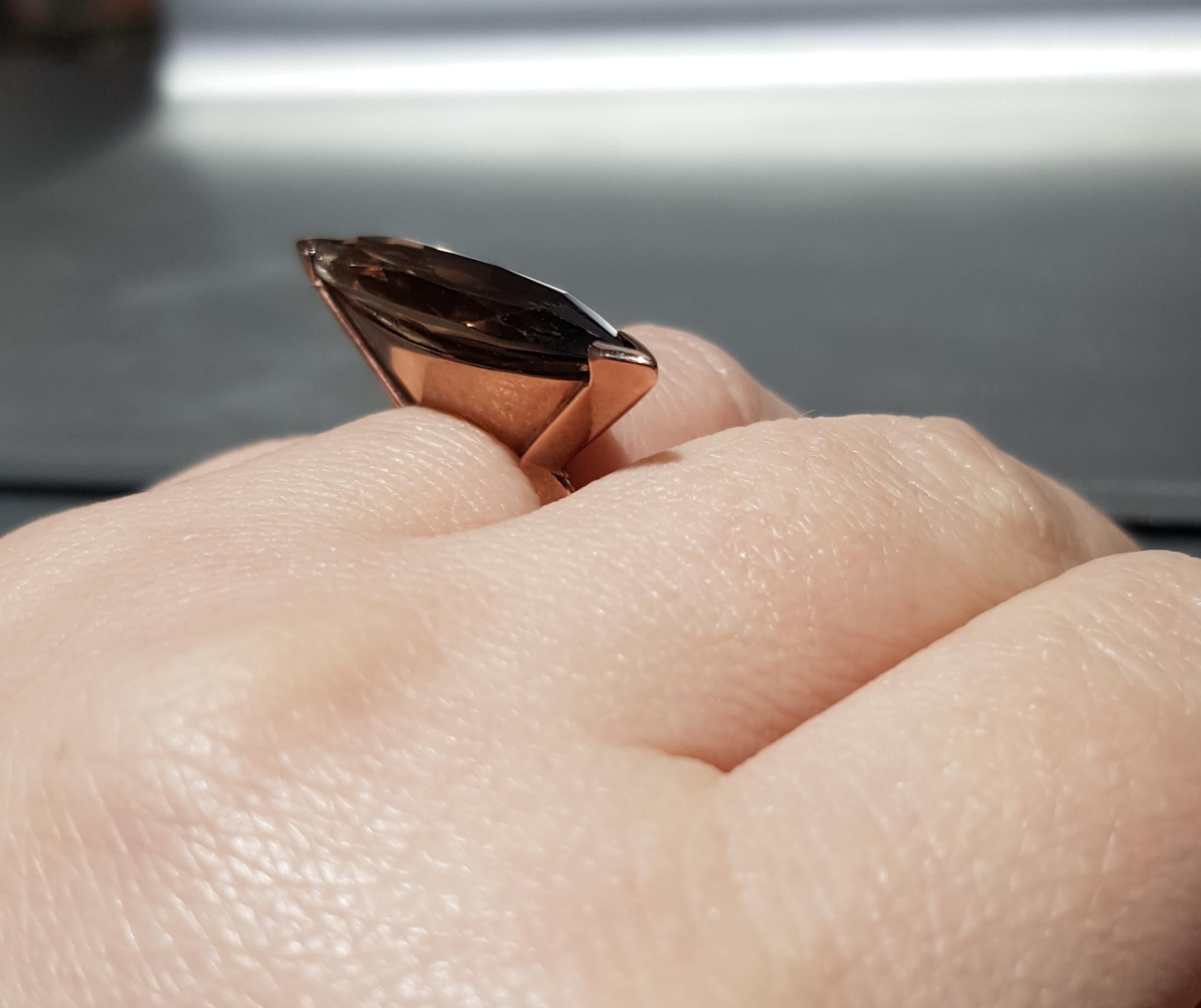 large Smokey Quartz in a  modern and stylised rose gold mount the side view of this ring is amazing and it is deceptively comfortable to wear.
ring size N & Half



AVAILABLE