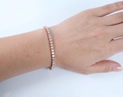 Bracelet « tennis » en or rose 14 carats serti d'un diamant rond de 9 carats