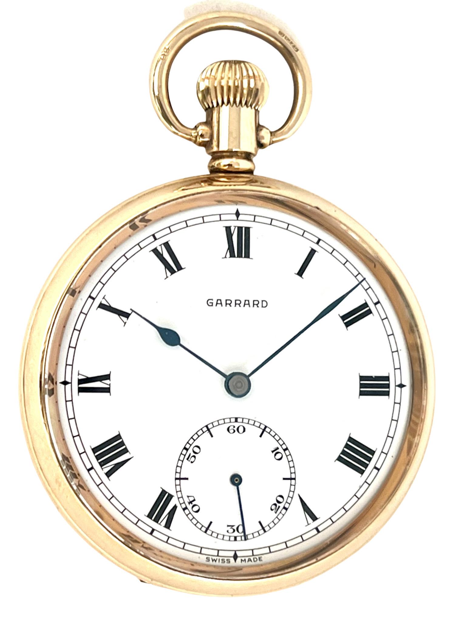 A handsome 9 Carat Solid Gold Open Faced Pocket Watch, retailed By Garrards, The Jewellers, London. The movement is by Burne Watch Company, Switzerland with Birmingham Hallmark 1965.

The solid gold case has a bevelled glass front and a crisp white