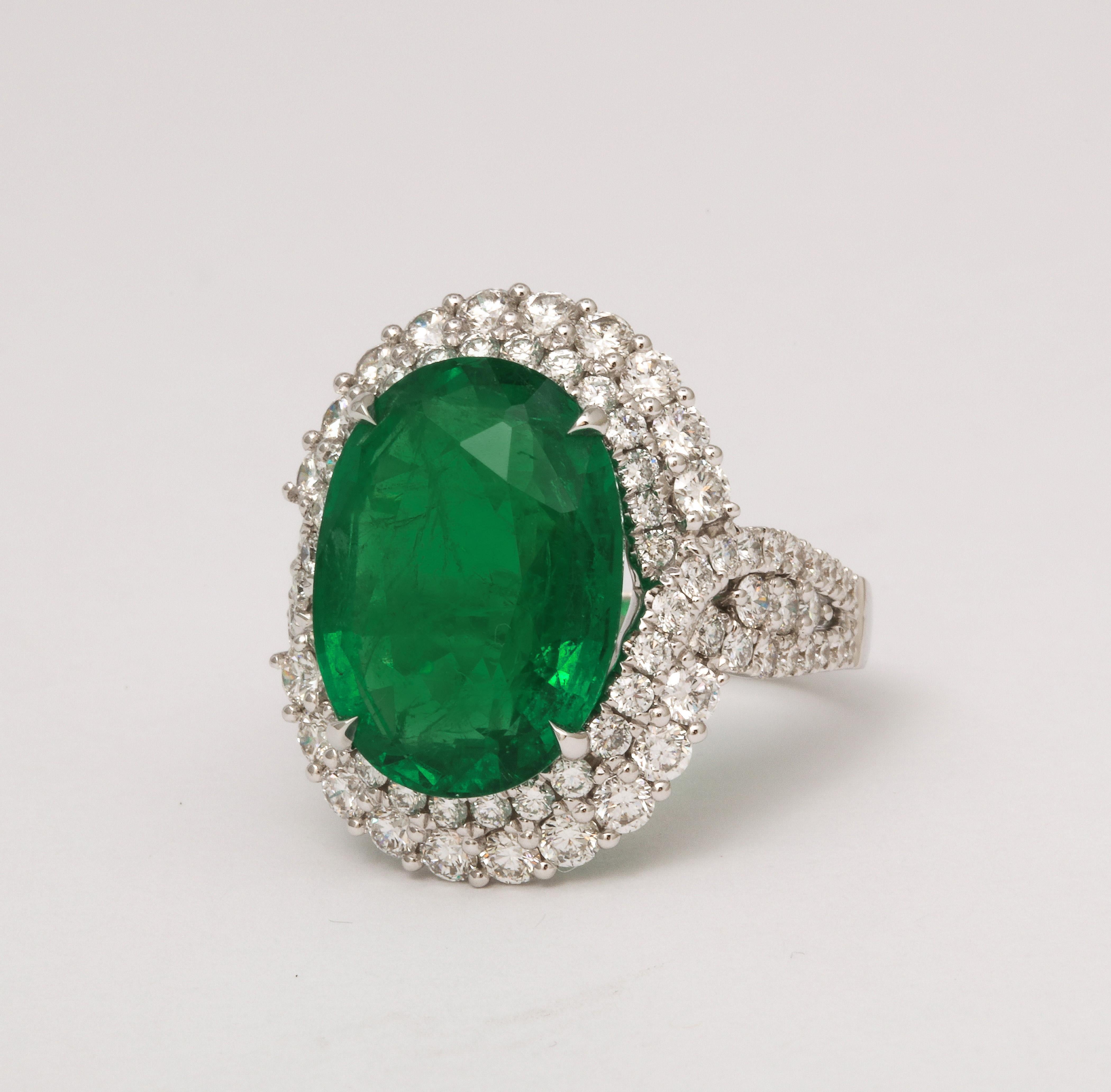 Oval Cut 9 carat Vivid Green Emerald and Diamond Ring  For Sale