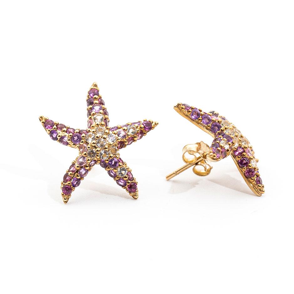 Crafted in 9 carat yellow gold are these endearing starfish earrings encrusted with white sapphires and various striking shades of purple amethysts making these earrings perfectly magical. We have named this vintage goodness The Miranda Earrings. 