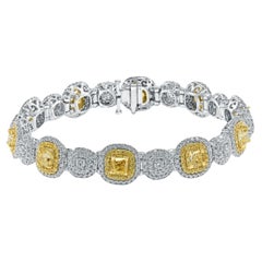 Pulsera de tenis de oro de 14 quilates con diamantes blancos y talla cojín amarillo de 9 quilates