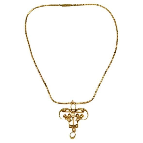 Pendentif en or 9 carats et perles naturelles sur chaîne de 9 carats datant d'environ 1900