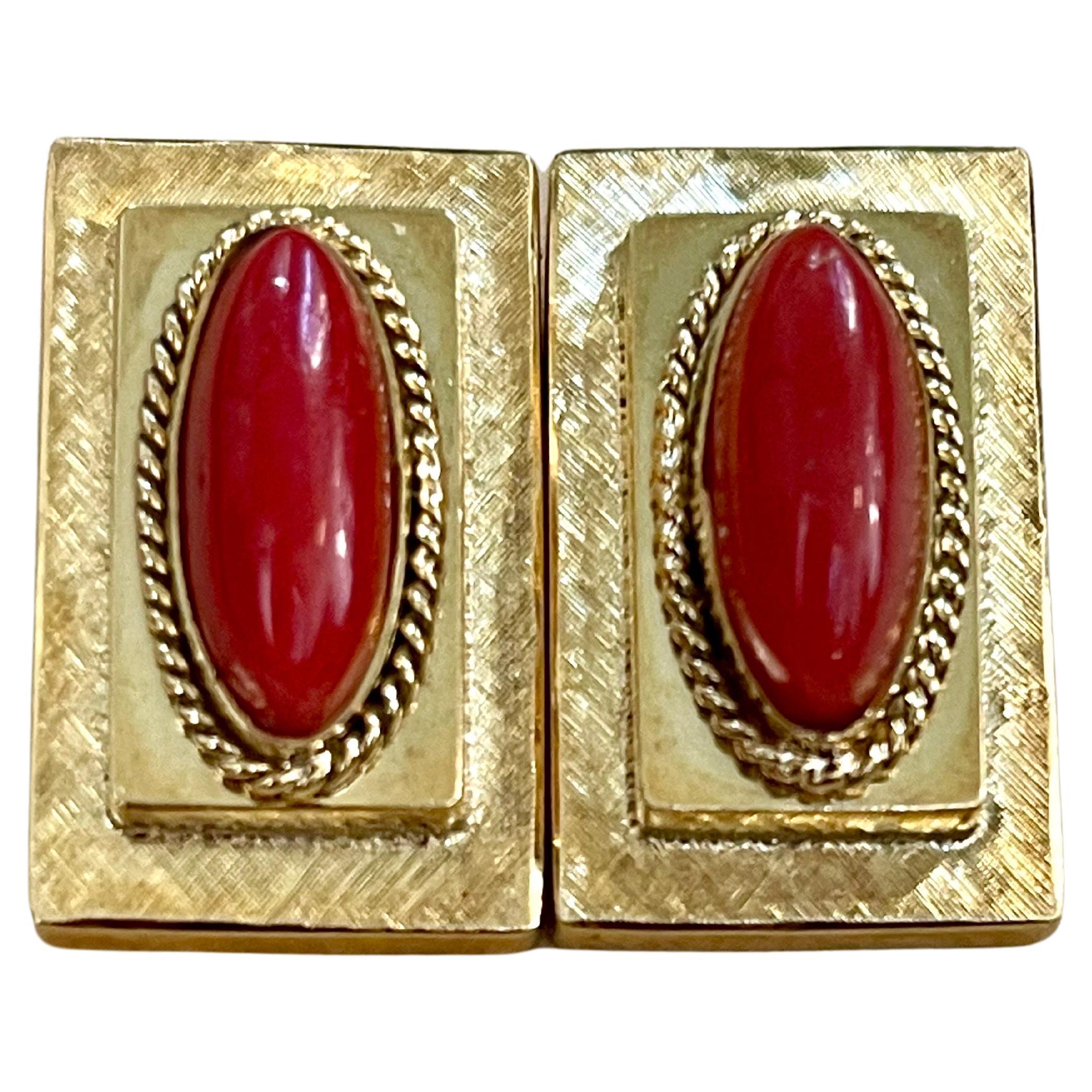  approximately 9 carat Natural Red Coral  Large Stud Earring in 18 Karat Yellow Gold , Clip on
 Coral Natural , Very Red/Tomato color , Very desirable color and quality. Approximately 9 ct total
perfect pair made in 18 Karat yellow gold. Natural