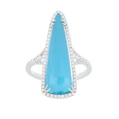 9 ct Sky Blue Topaz and Diamond Studded Ring in 14karat White Gold