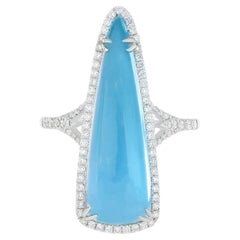 9 ct Sky Blue Topaz and Diamond Studded Ring in 14karat White Gold