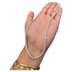 9 Ct Tennis Necklace with 5 heart shaped diamonds set in bezel in 14k Gold.
