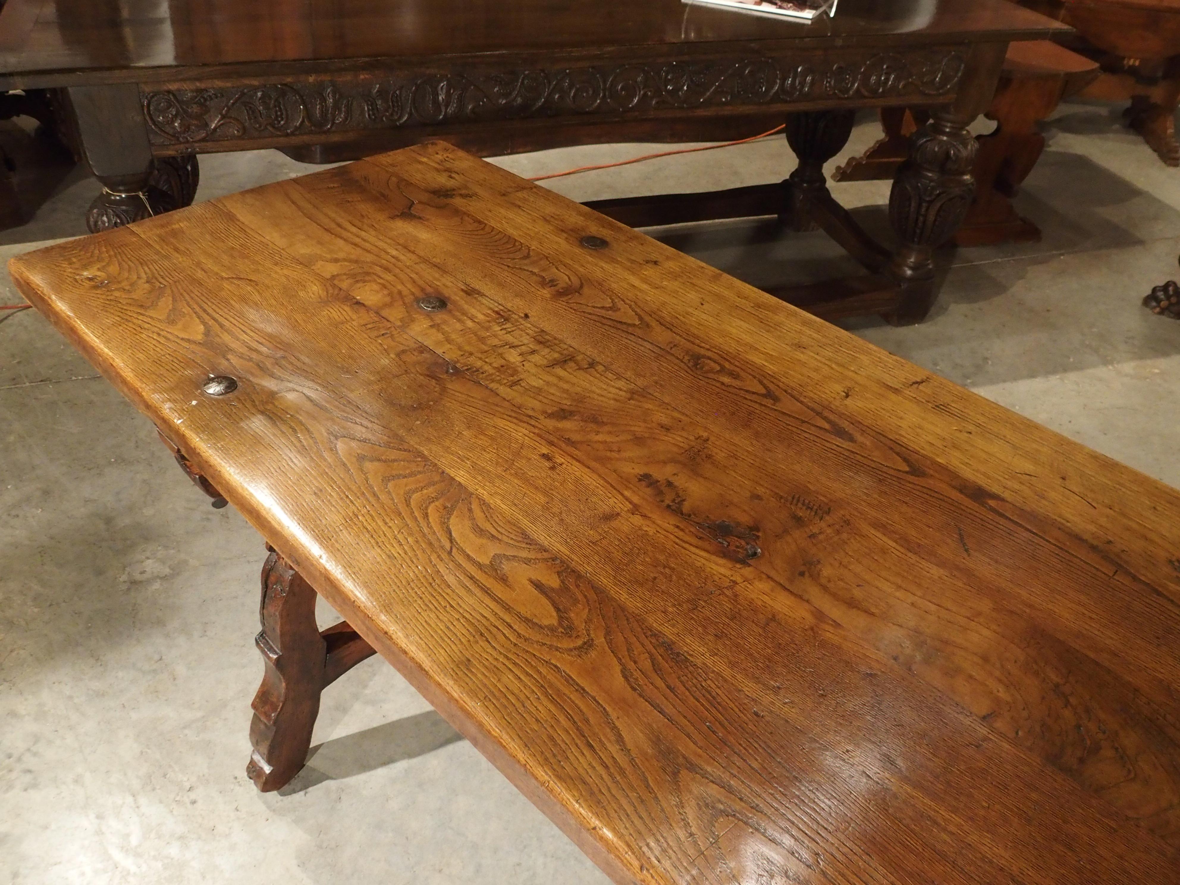 Catalan tables from Spain were originally made to be easily taken apart for frequent transport. In the tradition of the earliest Spanish tables, which simply consisted of boards which were laid upon trestles, there is no under-framing on this table.