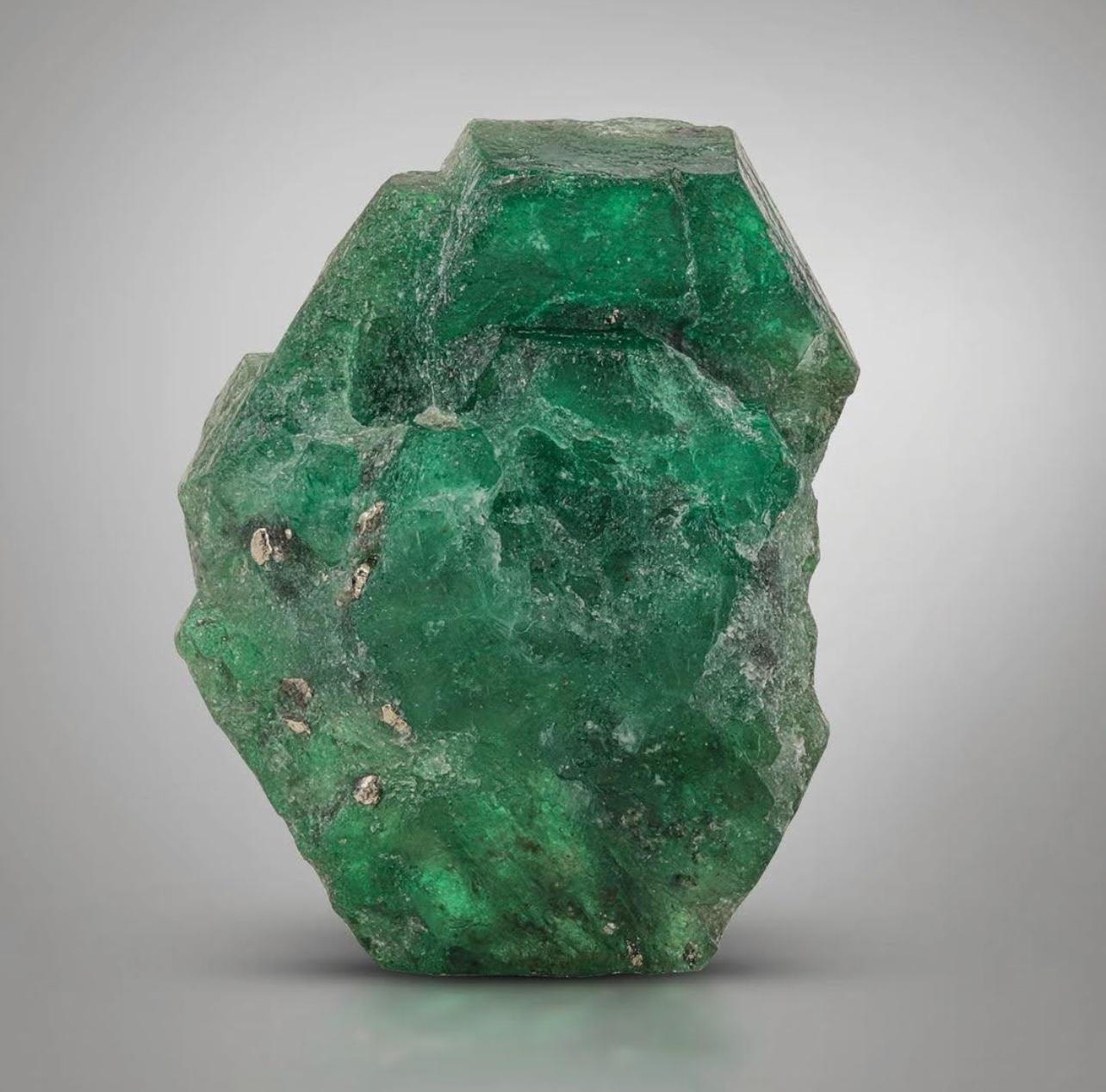Product Information:

Specimen Type: Emerald Crystal on Pyrite

Weight: 9 grams

Dimension: H: 3 x W: 2.3 x D: 1.3 cm

Origin: Swat Valley, KPK Province, Pakistan

Treatment: None

Description:

This stunning specimen is a vibrant green emerald