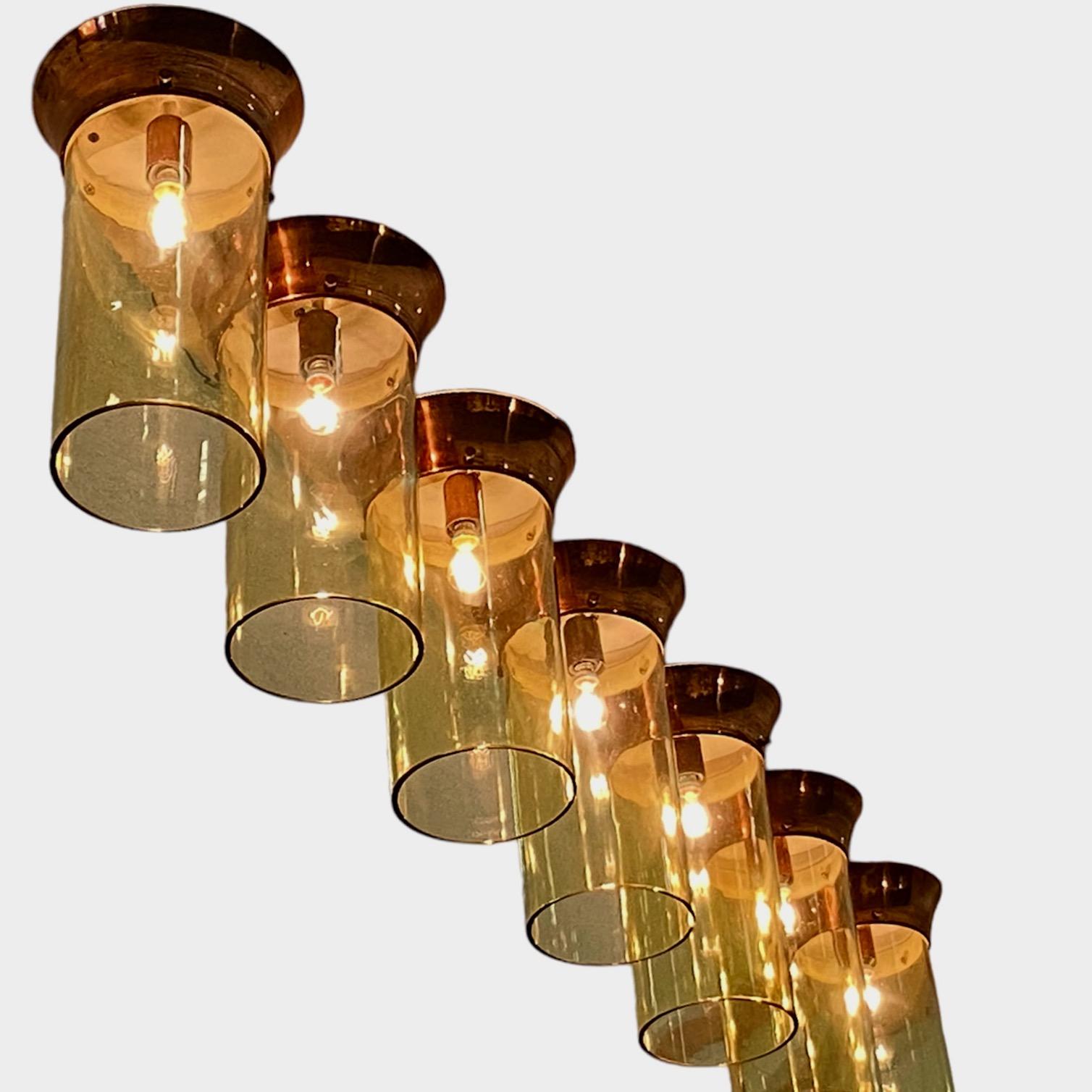 A rare large Set of 9 x vintage Italian copper and amber glass plafonniers or Flush Mount ceiling lights. This is an interesting and unusual copper set that would look really good over a large kitchen island or in a long corridor.