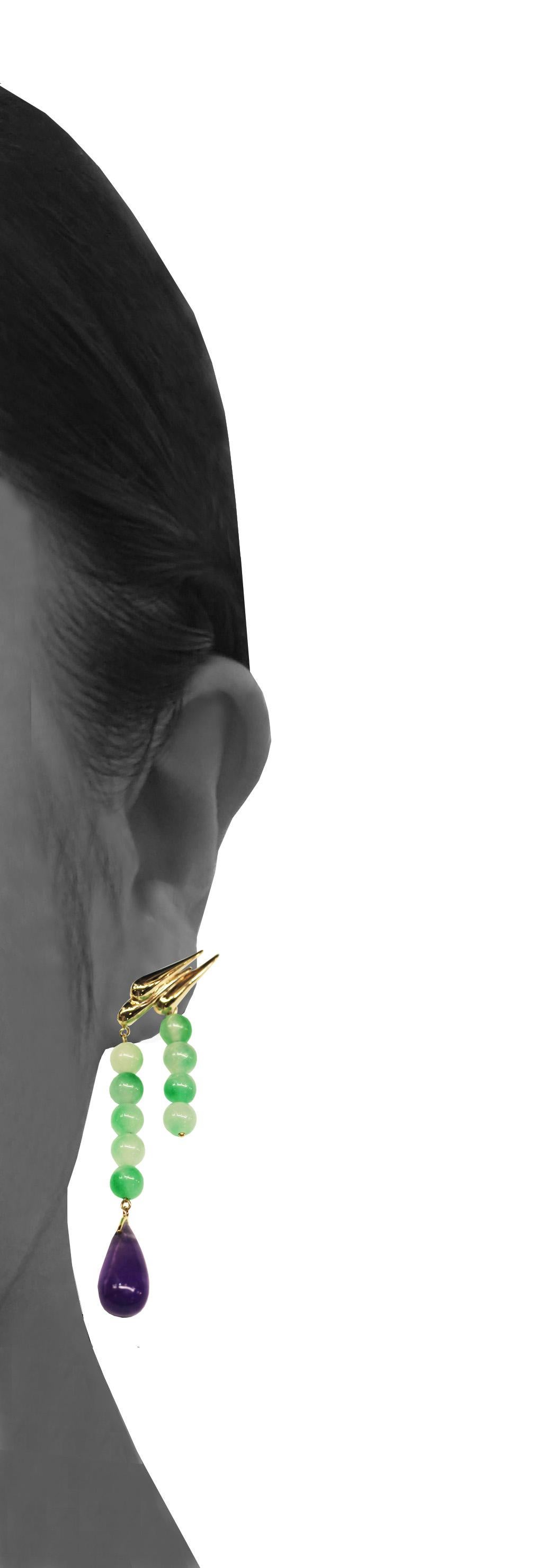 This modern handmade British-London Hallmarked 9 karat yellow gold earrings, with natural jade and amethyst is from MAIKO NAGAYAMA's early work as the starting point of one of the Haute Couture Collection called 