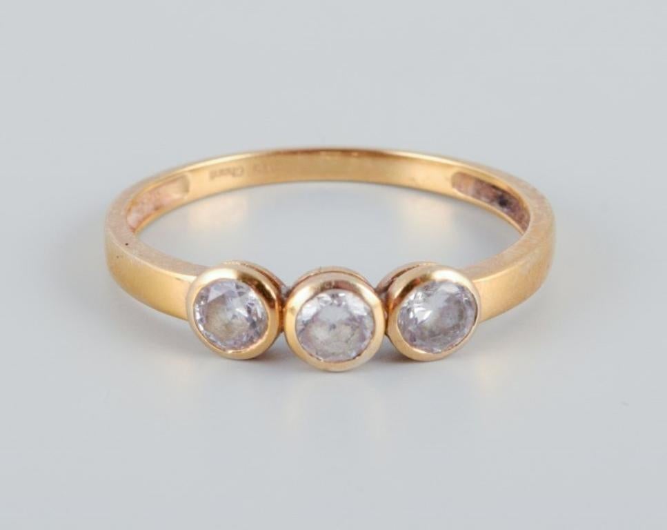 9-karat Chanti gold ring adorned with three semi-precious stones. Modernist design.
From the 1970s/1980s.
Stamped.
In excellent condition.
Ring size: 17 mm. (US approx. 7)
