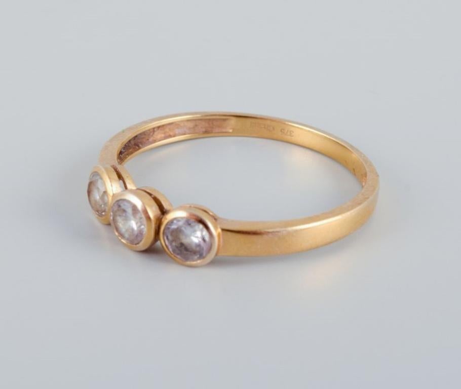 Modern 9-karat Chanti gold ring adorned with three semi-precious stones. For Sale