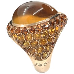 9 Karat Gold Cocktail Ring with Orange Citrine Pear Cabochon and Citrines Pavé