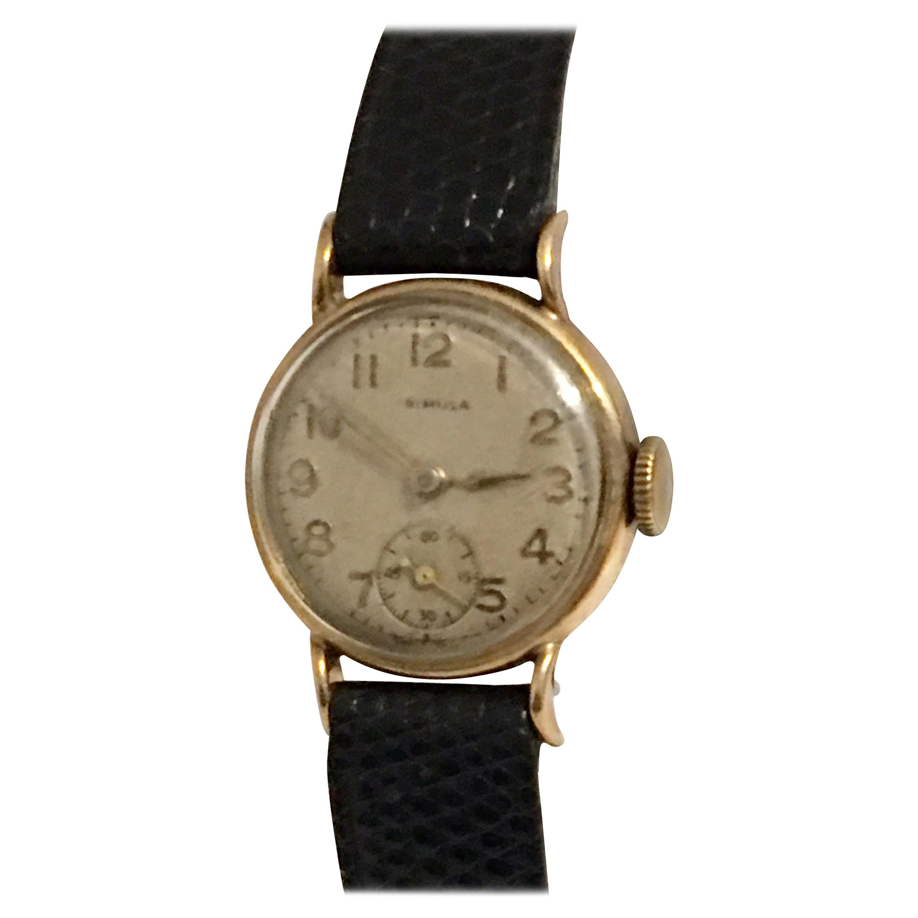 9 Karat Gold Vintage 1950s Ladies Swiss Wristwatch For Sale