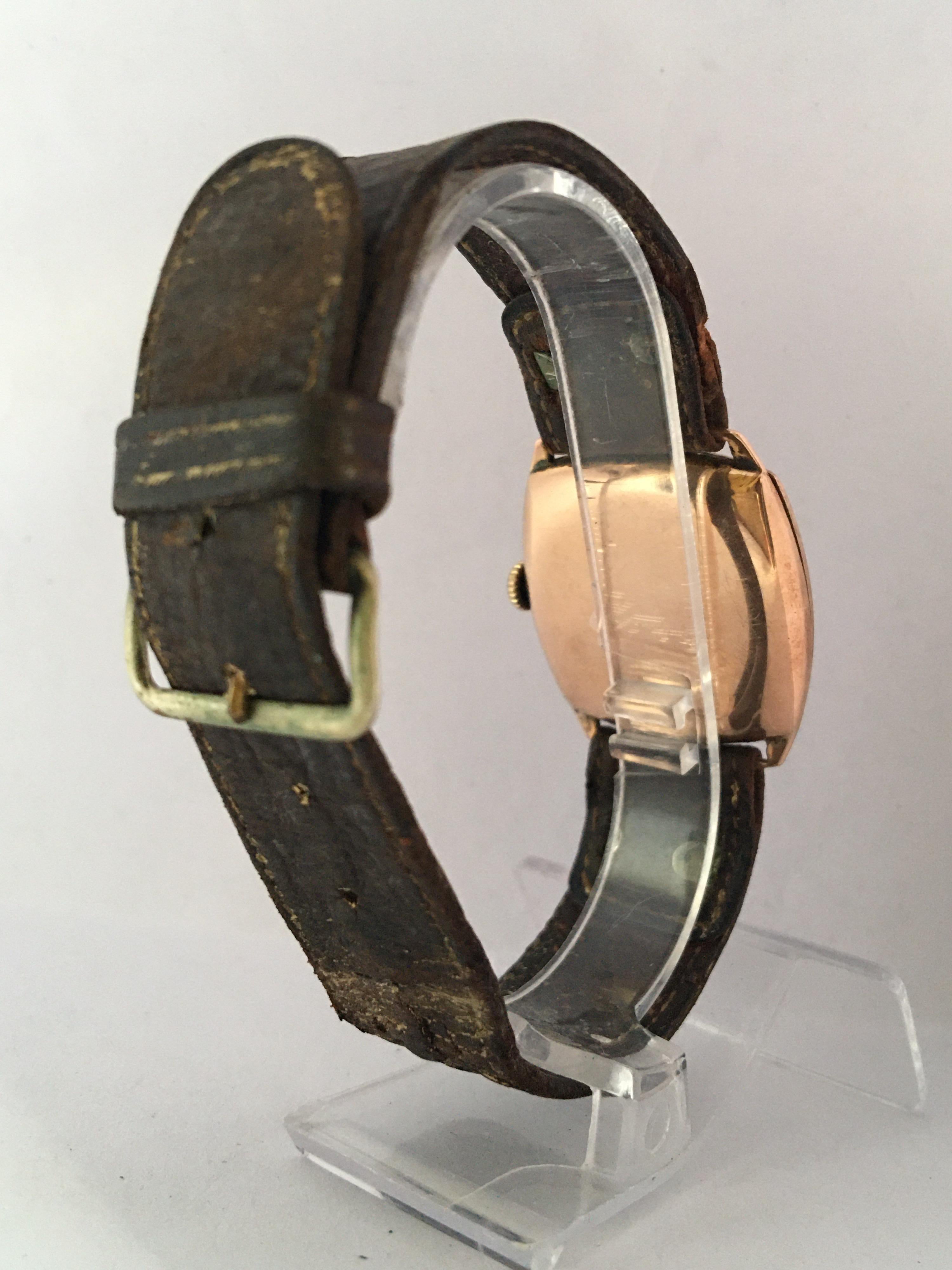 vintage record gold watch