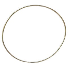 9 Karat Oval Yellow Gold Bangle